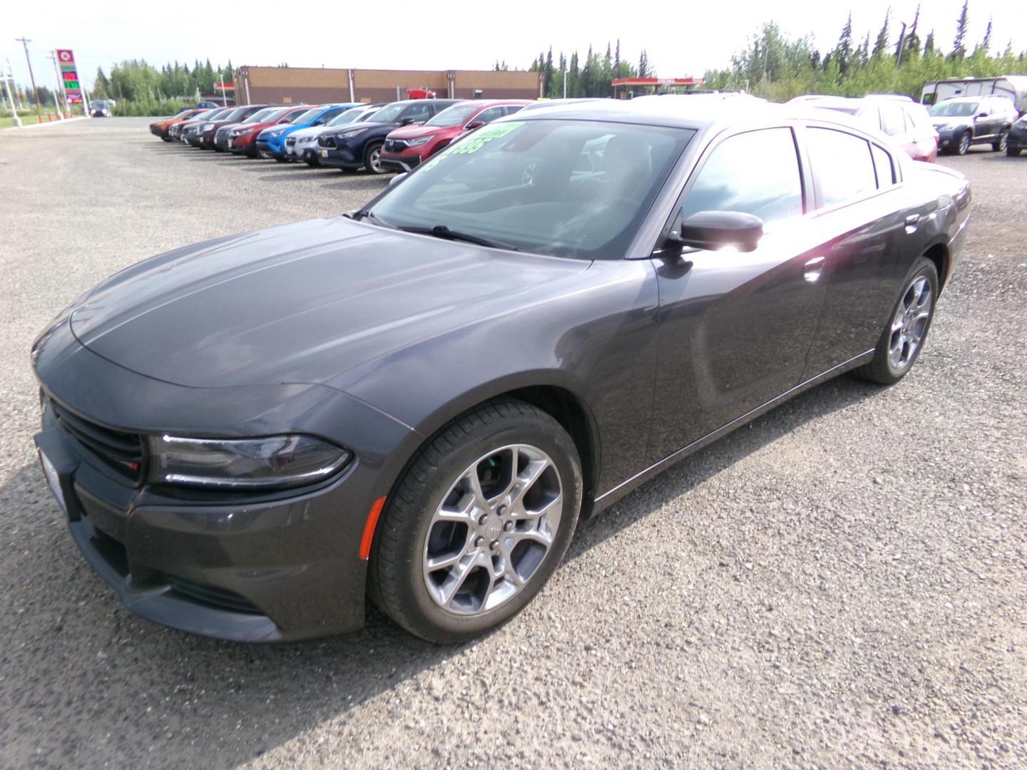 2015 Grey Dodge Charger SXT AWD (2C3CDXJG9FH) with an 3.6L V6 DOHC 24V engine, 8-Speed Automatic transmission, located at 2630 Philips Field Rd., Fairbanks, AK, 99709, (907) 458-0593, 64.848068, -147.780609 - Photo#0