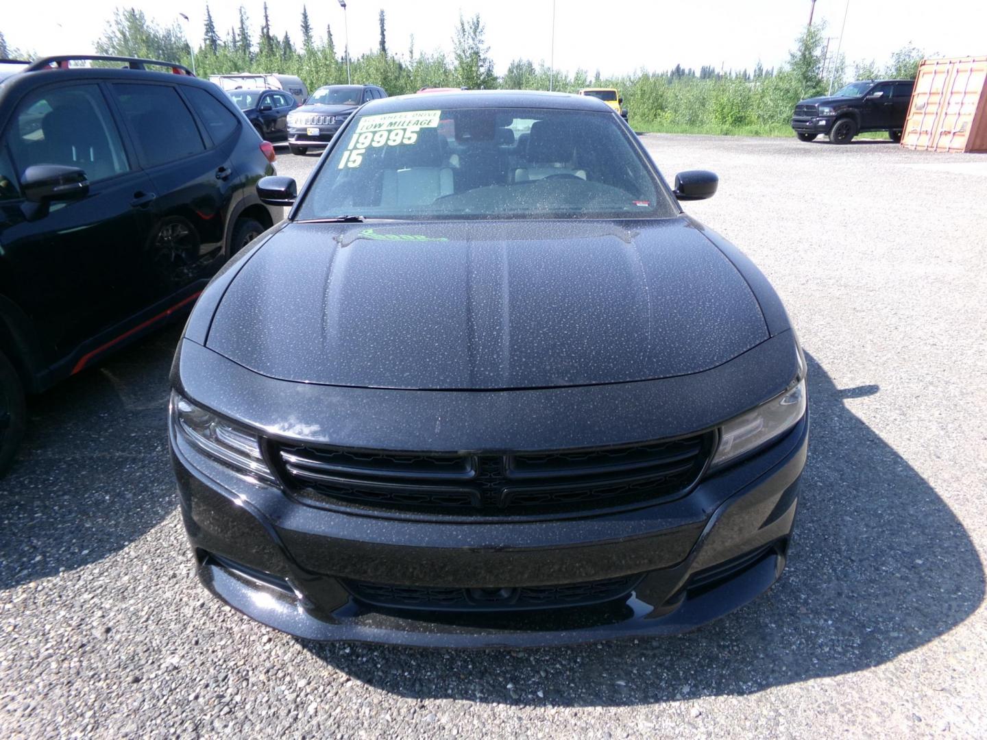 2015 Black Dodge Charger SXT AWD (2C3CDXJG1FH) with an 3.6L V6 DOHC 24V engine, 8-Speed Automatic transmission, located at 2630 Philips Field Rd., Fairbanks, AK, 99709, (907) 458-0593, 64.848068, -147.780609 - Photo#1