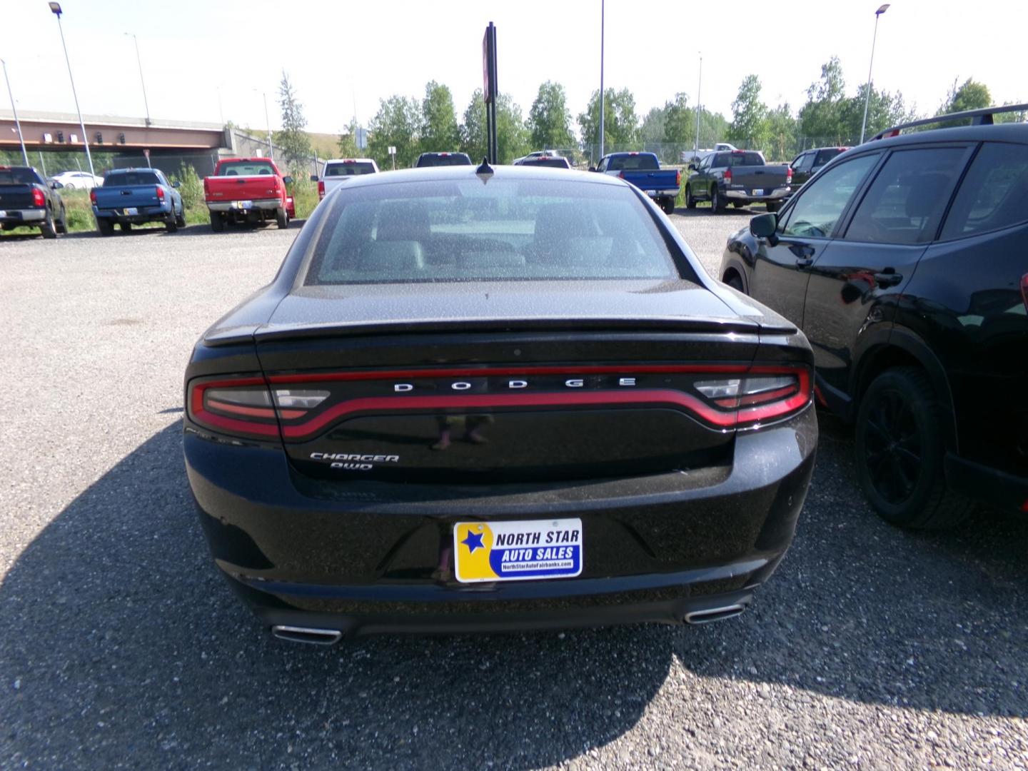 2015 Black Dodge Charger SXT AWD (2C3CDXJG1FH) with an 3.6L V6 DOHC 24V engine, 8-Speed Automatic transmission, located at 2630 Philips Field Rd., Fairbanks, AK, 99709, (907) 458-0593, 64.848068, -147.780609 - Photo#3