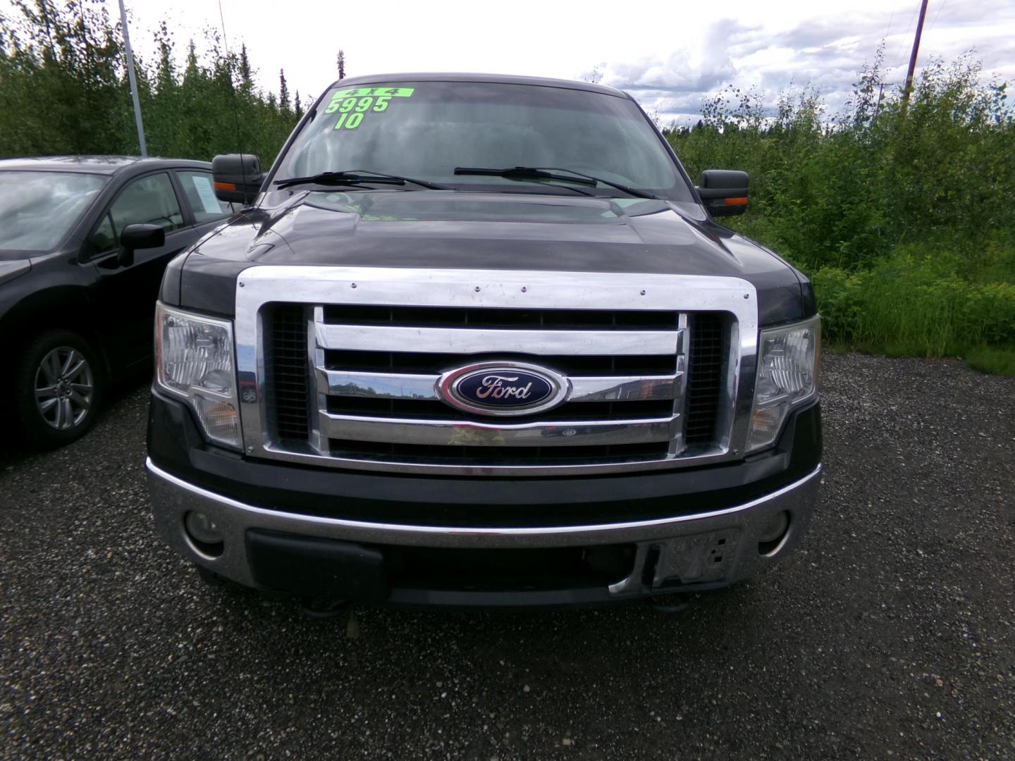 2010 Black /Tan Ford F-150 Lariat SuperCrew 5.5-ft. Bed 4WD (1FTFW1EV1AF) with an 5.4L V8 SOHC 24V FFV engine, 4-Speed Automatic transmission, located at 2630 Philips Field Rd., Fairbanks, AK, 99709, (907) 458-0593, 64.848068, -147.780609 - Photo#1