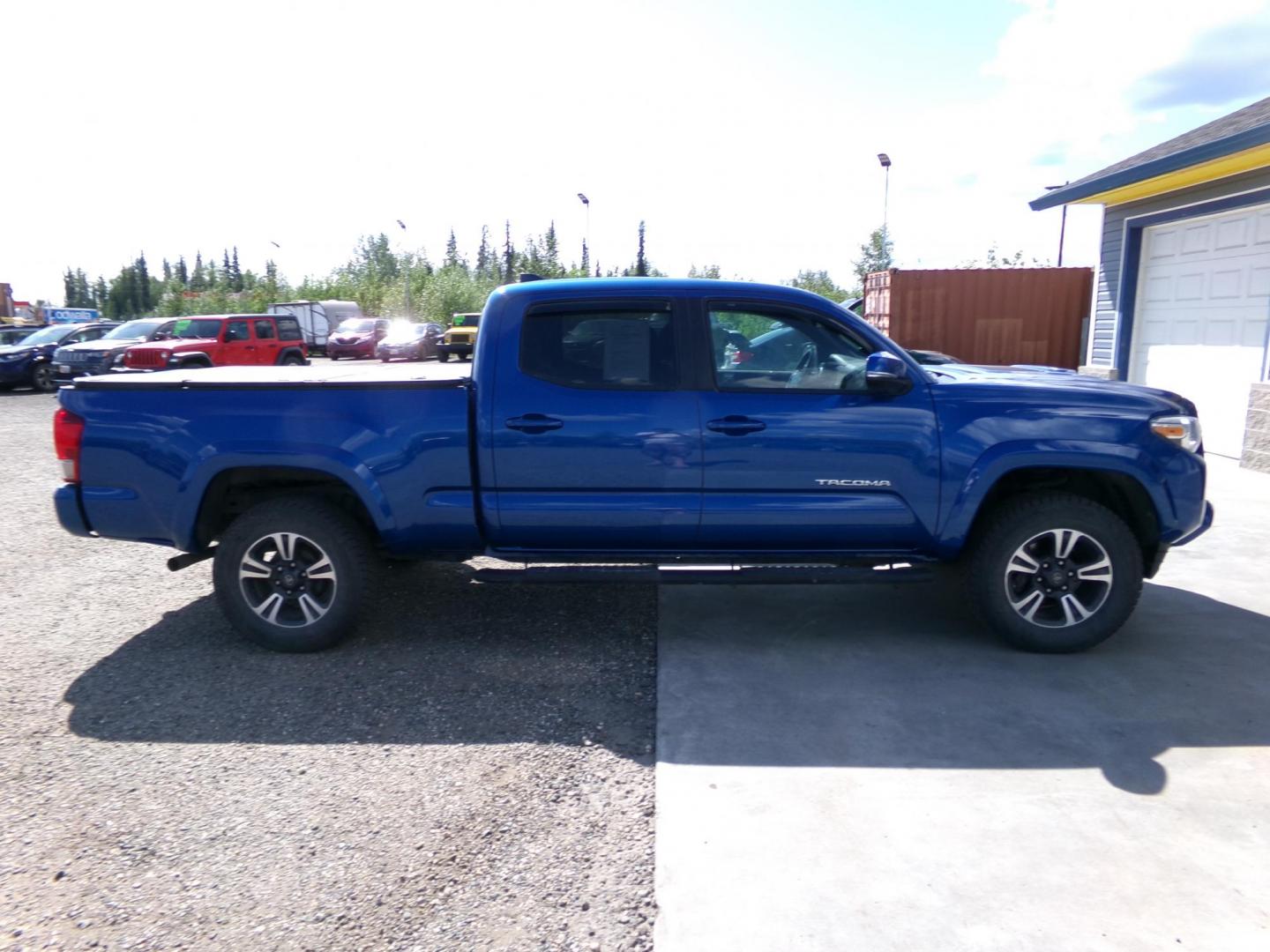 2017 Blue /Black Toyota Tacoma SR5 Double Cab Super Long Bed V6 6AT 4WD (3TMDZ5BN4HM) with an 3.6L V6 DOHC 24V engine, 6A transmission, located at 2630 Philips Field Rd., Fairbanks, AK, 99709, (907) 458-0593, 64.848068, -147.780609 - Photo#2