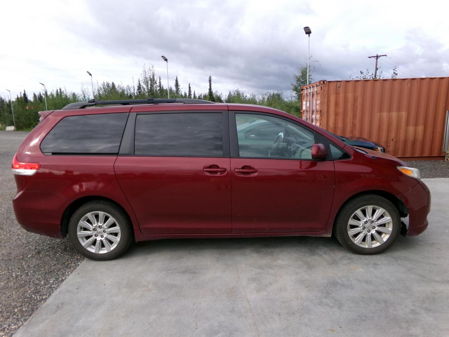 2014 Red Toyota Sienna LE AWD 7-Passenger V6 (5TDJK3DC8ES) with an 3.5L V6 EFI DOHC 24V engine, 5-Speed Automatic transmission, located at 2630 Philips Field Rd., Fairbanks, AK, 99709, (907) 458-0593, 64.848068, -147.780609 - Photo#2
