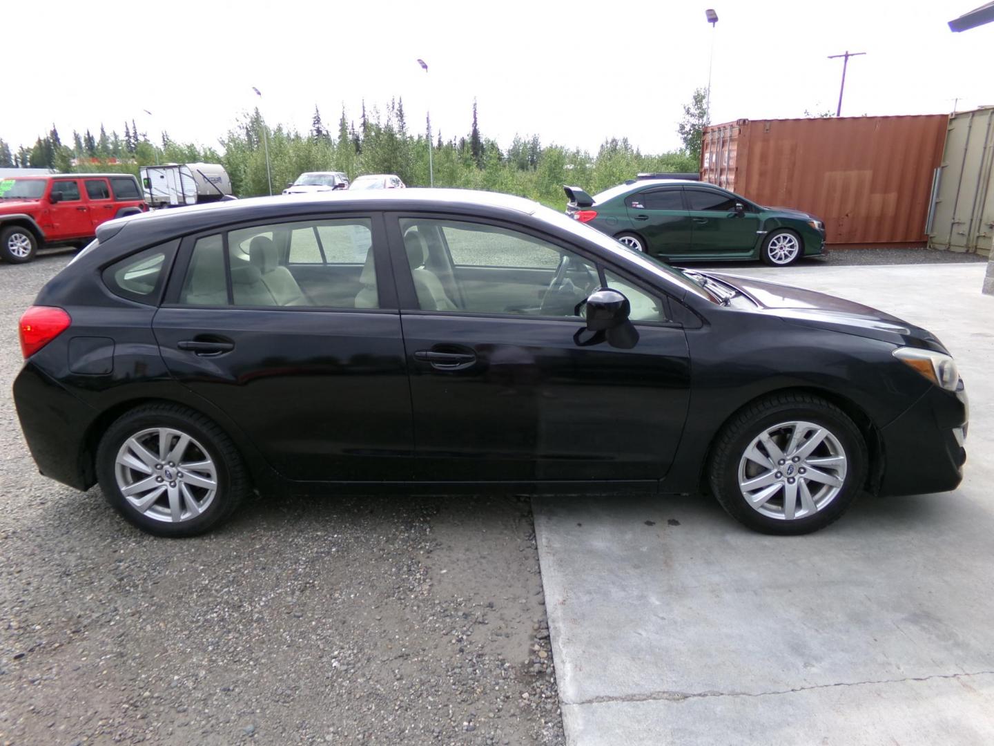 2016 Black /Tan Subaru Impreza 2.0i Premium PZEV 5-Door (JF1GPAB66G8) with an 2.0L H4 DOHC 16V engine, CVT transmission, located at 2630 Philips Field Rd., Fairbanks, AK, 99709, (907) 458-0593, 64.848068, -147.780609 - Photo#4
