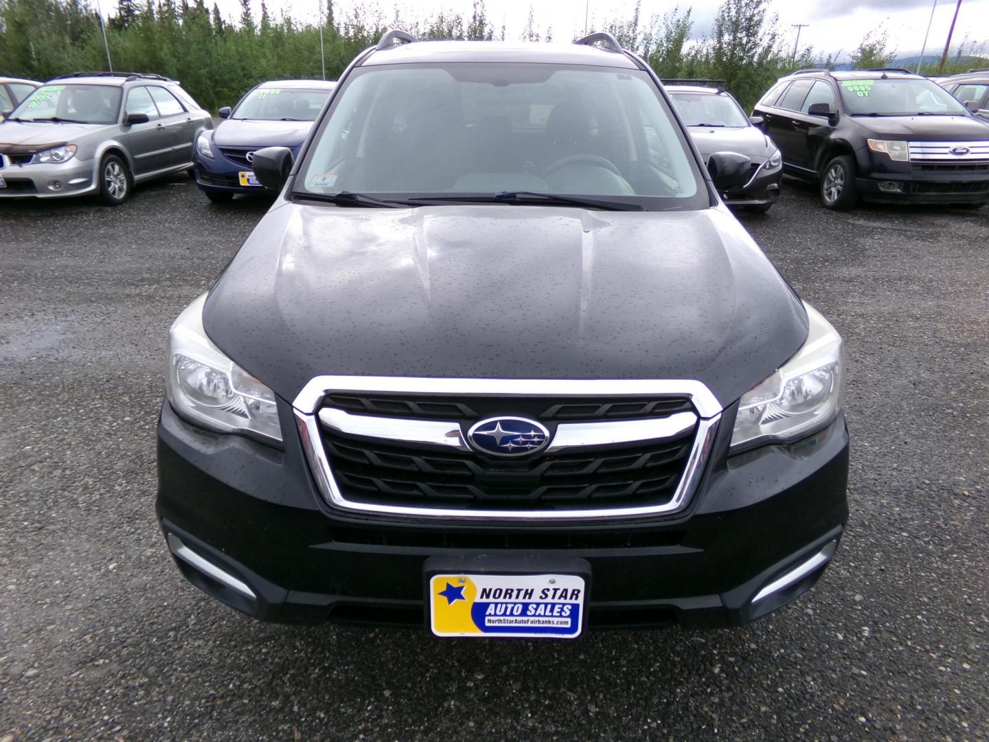 2017 Black Subaru Forester 2.5i Premium PZEV CVT (JF2SJAEC3HH) with an 2.5L H4 SOHC 16V engine, CVT transmission, located at 2630 Philips Field Rd., Fairbanks, AK, 99709, (907) 458-0593, 64.848068, -147.780609 - Photo#1