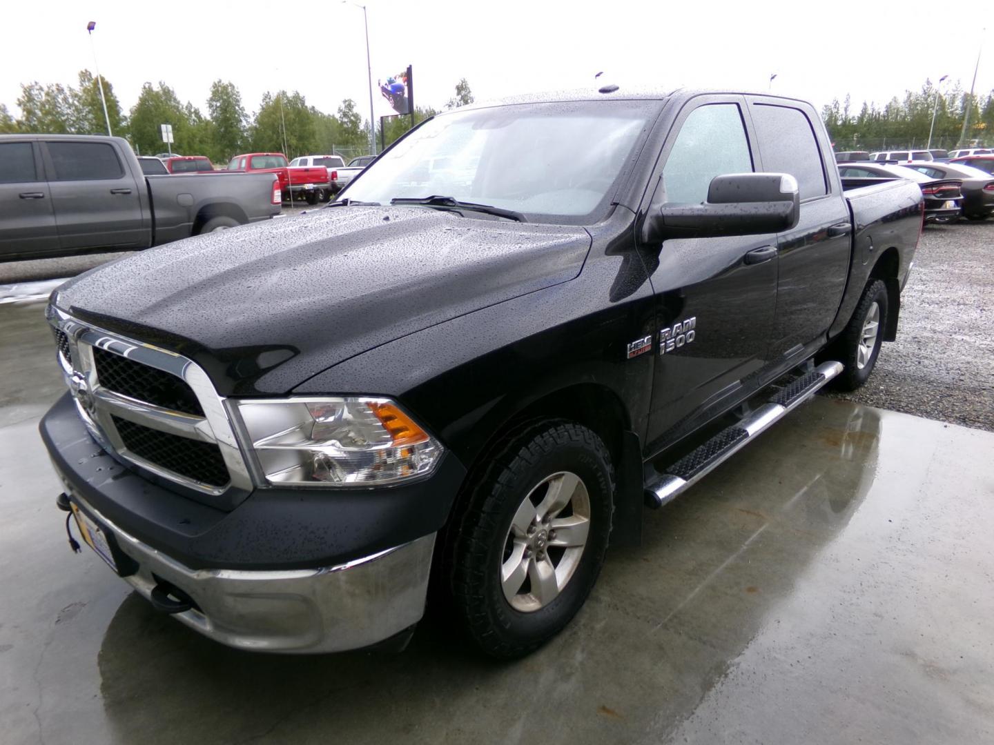 2016 Black Dodge 1500 Tradesman Crew Cab SWB 4WD (3C6RR7KTXGG) with an 5.7L V8 OHV 16V engine, 6A transmission, located at 2630 Philips Field Rd., Fairbanks, AK, 99709, (907) 458-0593, 64.848068, -147.780609 - Photo#0