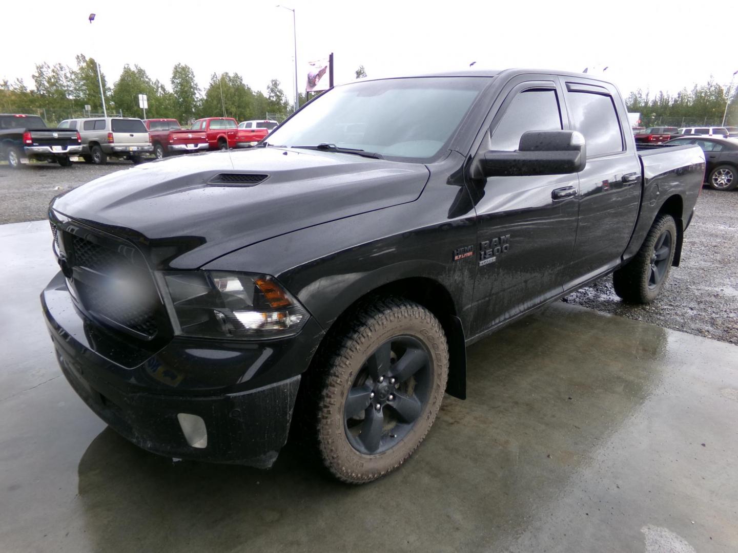 2019 Black Dodge 1500 SLT Crew Cab SWB 4WD (1C6RR7LT8KS) with an 5.7L V8 OHV 16V engine, 8A transmission, located at 2630 Philips Field Rd., Fairbanks, AK, 99709, (907) 458-0593, 64.848068, -147.780609 - Photo#0