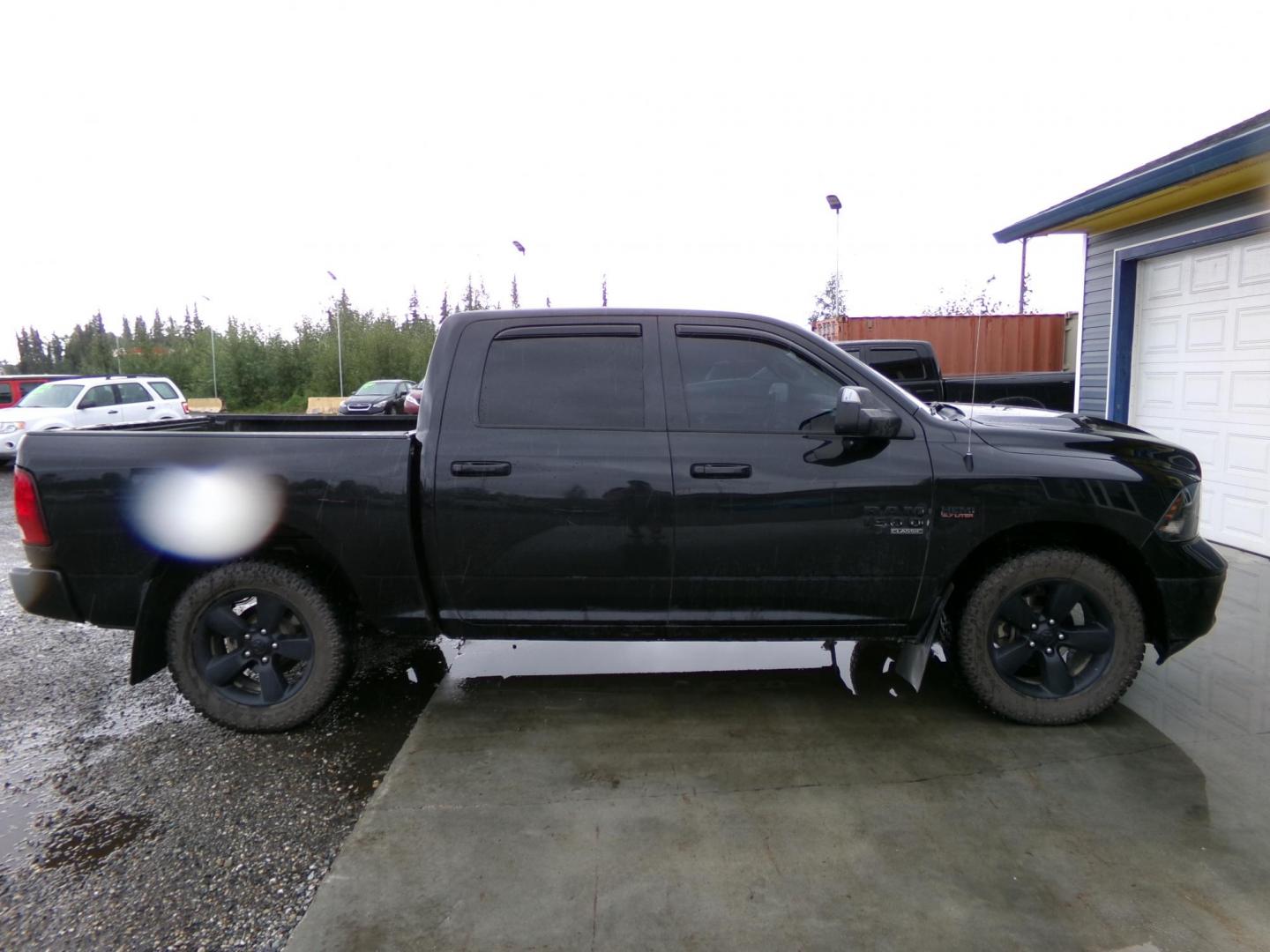 2019 Black Dodge 1500 SLT Crew Cab SWB 4WD (1C6RR7LT8KS) with an 5.7L V8 OHV 16V engine, 8A transmission, located at 2630 Philips Field Rd., Fairbanks, AK, 99709, (907) 458-0593, 64.848068, -147.780609 - Photo#2