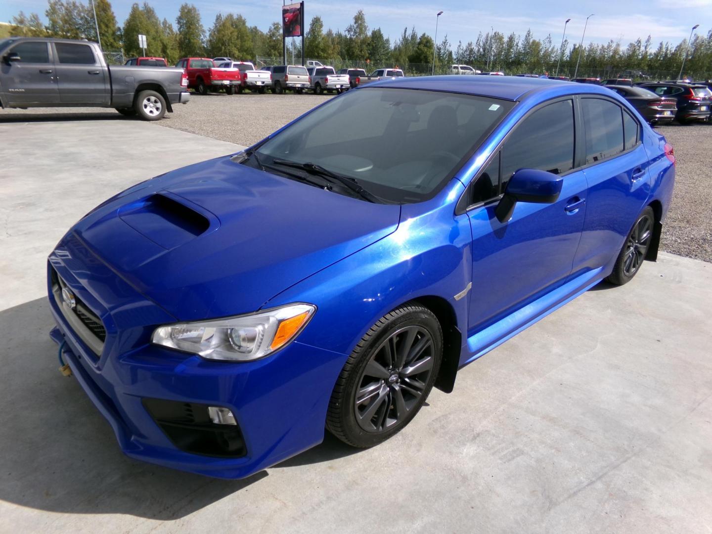 2017 Blue /Black Subaru WRX 4-Door (JF1VA1B66H9) with an 2.0L H4 DOHC 16V engine, 6-Speed Manual transmission, located at 2630 Philips Field Rd., Fairbanks, AK, 99709, (907) 458-0593, 64.848068, -147.780609 - Photo#0