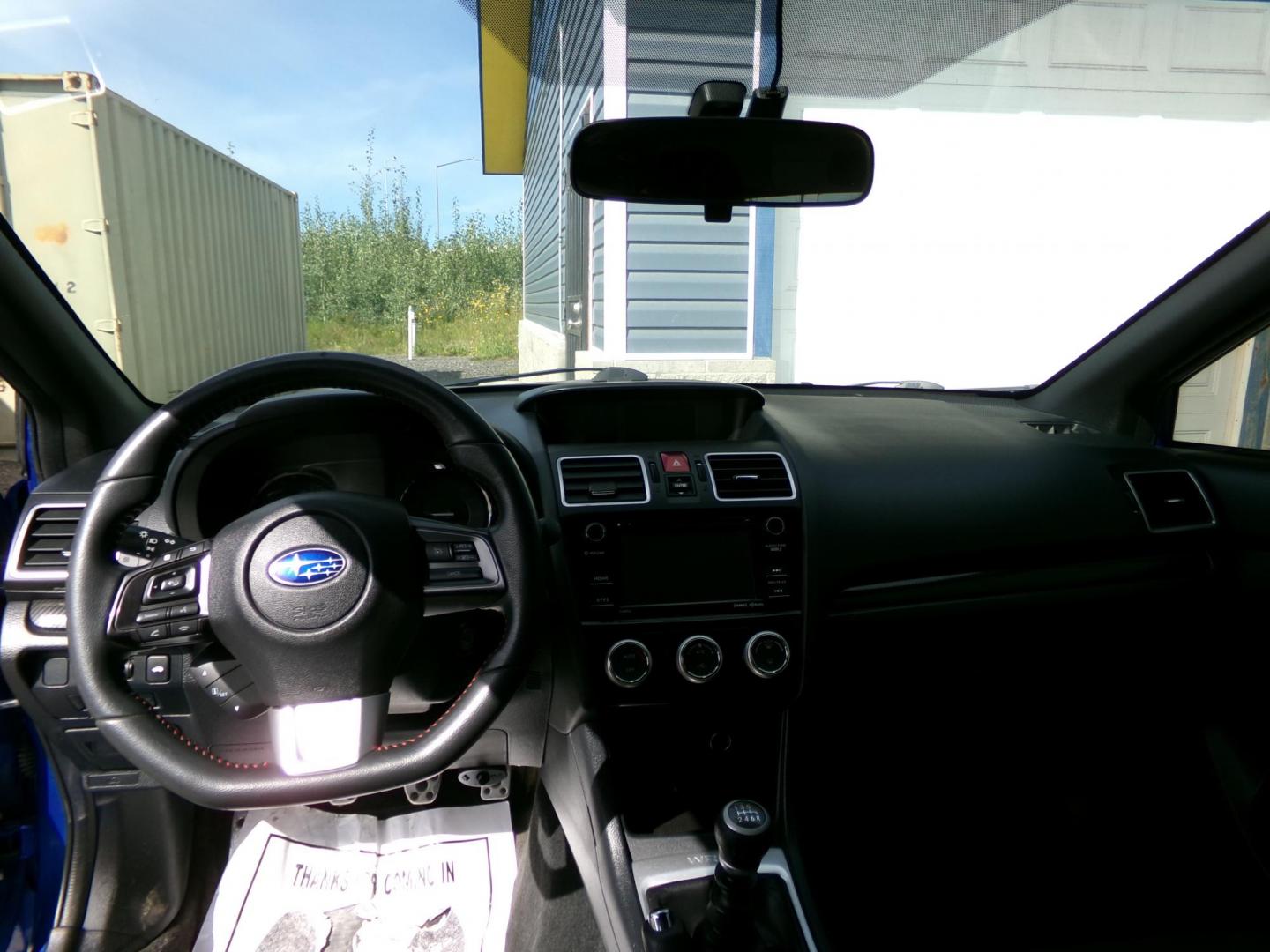 2017 Blue /Black Subaru WRX 4-Door (JF1VA1B66H9) with an 2.0L H4 DOHC 16V engine, 6-Speed Manual transmission, located at 2630 Philips Field Rd., Fairbanks, AK, 99709, (907) 458-0593, 64.848068, -147.780609 - Photo#6
