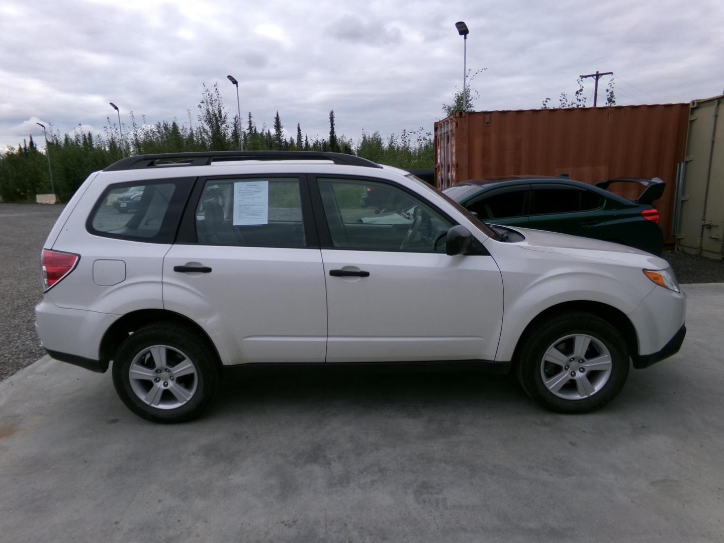 2011 White Subaru Forester 2.5X Touring (JF2SHABC6BH) with an 2.5L H4 SOHC 16V engine, 5-Speed Manual transmission, located at 2630 Philips Field Rd., Fairbanks, AK, 99709, (907) 458-0593, 64.848068, -147.780609 - Photo#2