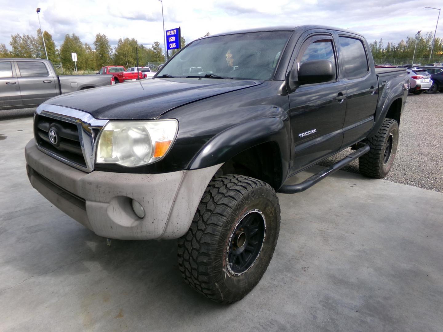 2007 Black Toyota Tacoma Double Cab V6 4WD (3TMLU42N37M) with an 4.0L V6 DOHC 24V engine, 6-Speed Manual Overdrive transmission, located at 2630 Philips Field Rd., Fairbanks, AK, 99709, (907) 458-0593, 64.848068, -147.780609 - Photo#0