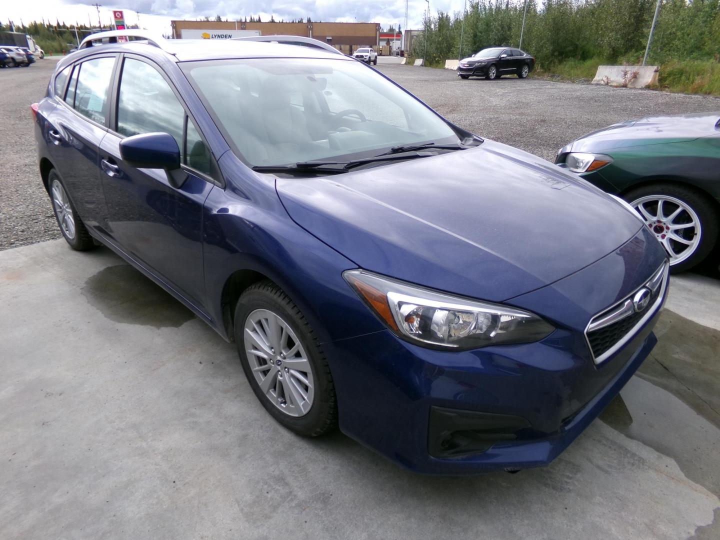 2018 Blue Subaru Impreza 2.0i Premium CVT 5-Door (4S3GTAB69J3) with an 2.0L H4 DOHC 16V engine, CVT transmission, located at 2630 Philips Field Rd., Fairbanks, AK, 99709, (907) 458-0593, 64.848068, -147.780609 - Photo#0