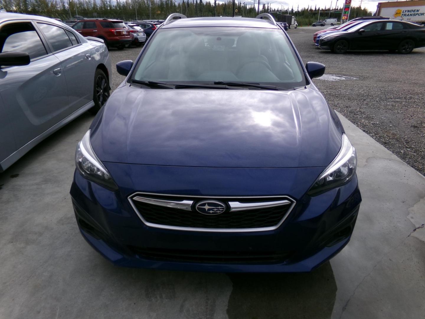 2018 Blue Subaru Impreza 2.0i Premium CVT 5-Door (4S3GTAB69J3) with an 2.0L H4 DOHC 16V engine, CVT transmission, located at 2630 Philips Field Rd., Fairbanks, AK, 99709, (907) 458-0593, 64.848068, -147.780609 - Photo#1
