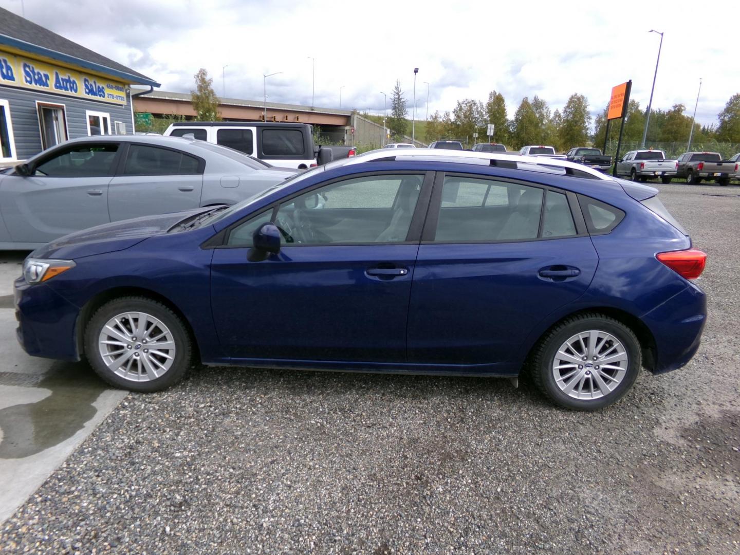 2018 Blue Subaru Impreza 2.0i Premium CVT 5-Door (4S3GTAB69J3) with an 2.0L H4 DOHC 16V engine, CVT transmission, located at 2630 Philips Field Rd., Fairbanks, AK, 99709, (907) 458-0593, 64.848068, -147.780609 - Photo#2