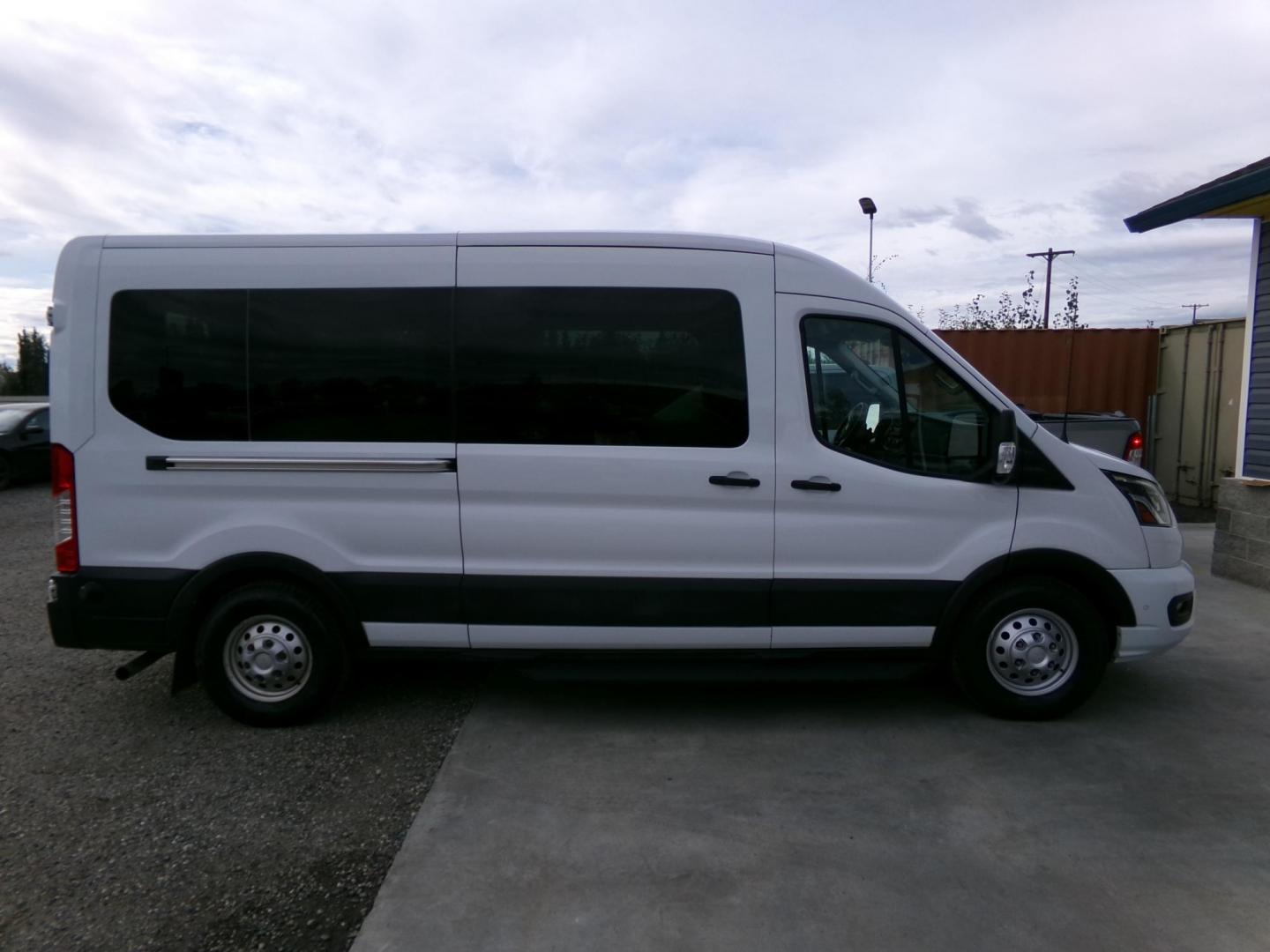 2021 White Ford Transit 350 Wagon Med. Roof XL w/Sliding Pass. 148-in. WB (1FBAX9C85MK) with an 3.5L V6 DOHC 24V engine, 6A transmission, located at 2630 Philips Field Rd., Fairbanks, AK, 99709, (907) 458-0593, 64.848068, -147.780609 - Photo#2