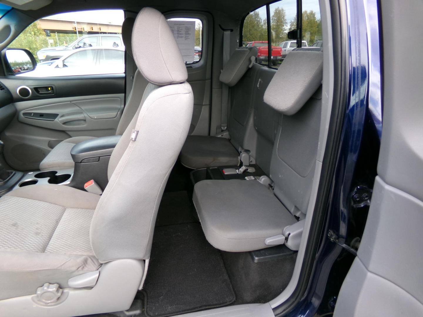 2013 Blue /Grey Toyota Tacoma Access Cab V6 4WD (5TFUU4ENXDX) with an 4.0L V6 DOHC 24V engine, 6-Speed Manual transmission, located at 2630 Philips Field Rd., Fairbanks, AK, 99709, (907) 458-0593, 64.848068, -147.780609 - Photo#6