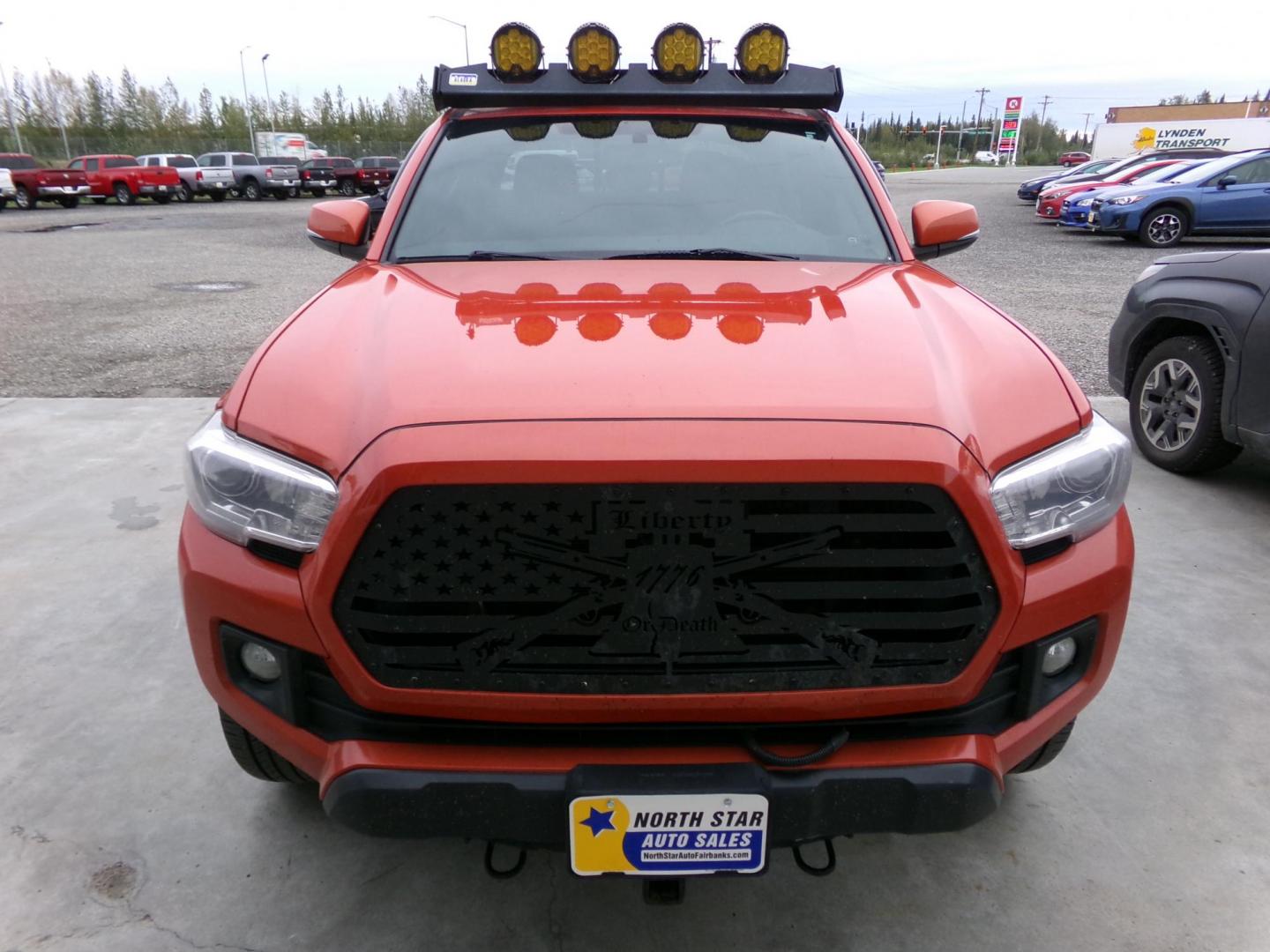 2016 Orange Toyota Tacoma SR5 Double Cab Long Bed V6 5AT 4WD (5TFCZ5ANXGX) with an 3.6L V6 DOHC 24V engine, 5A transmission, located at 2630 Philips Field Rd., Fairbanks, AK, 99709, (907) 458-0593, 64.848068, -147.780609 - Photo#1