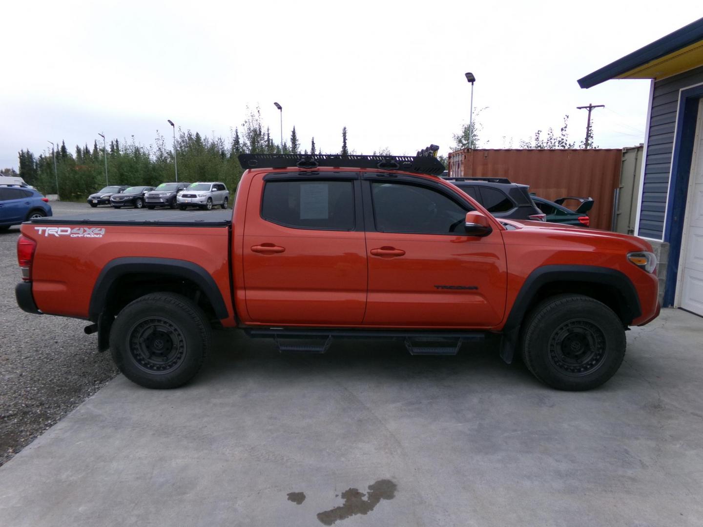2016 Orange Toyota Tacoma SR5 Double Cab Long Bed V6 5AT 4WD (5TFCZ5ANXGX) with an 3.6L V6 DOHC 24V engine, 5A transmission, located at 2630 Philips Field Rd., Fairbanks, AK, 99709, (907) 458-0593, 64.848068, -147.780609 - Photo#2