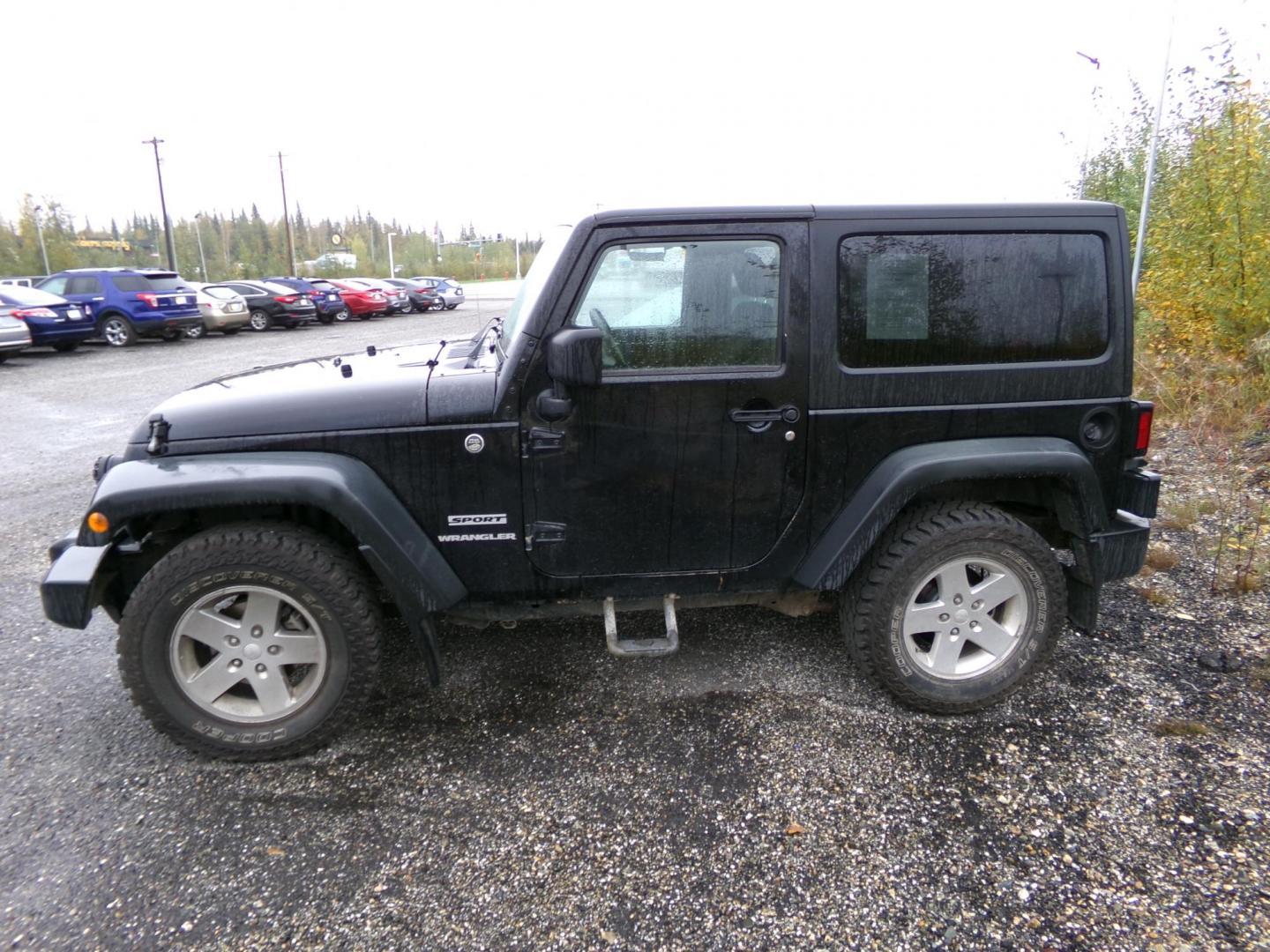 2012 Black Jeep Wrangler Sport 4WD (1C4AJWAG2CL) with an 3.6L V6 DOHC 24V FFV engine, located at 2630 Philips Field Rd., Fairbanks, AK, 99709, (907) 458-0593, 64.848068, -147.780609 - Photo#2