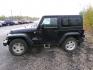 2012 Black Jeep Wrangler Sport 4WD (1C4AJWAG2CL) with an 3.6L V6 DOHC 24V FFV engine, located at 2630 Philips Field Rd., Fairbanks, AK, 99709, (907) 458-0593, 64.848068, -147.780609 - Photo#2