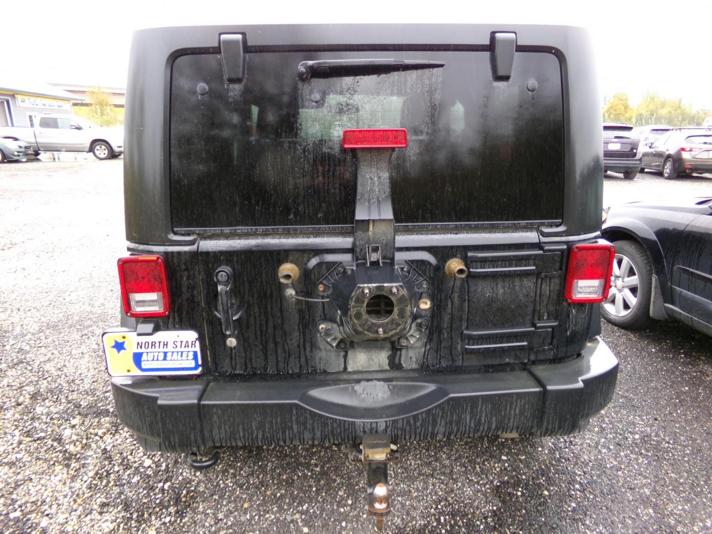 2012 Black Jeep Wrangler Sport 4WD (1C4AJWAG2CL) with an 3.6L V6 DOHC 24V FFV engine, located at 2630 Philips Field Rd., Fairbanks, AK, 99709, (907) 458-0593, 64.848068, -147.780609 - Photo#3