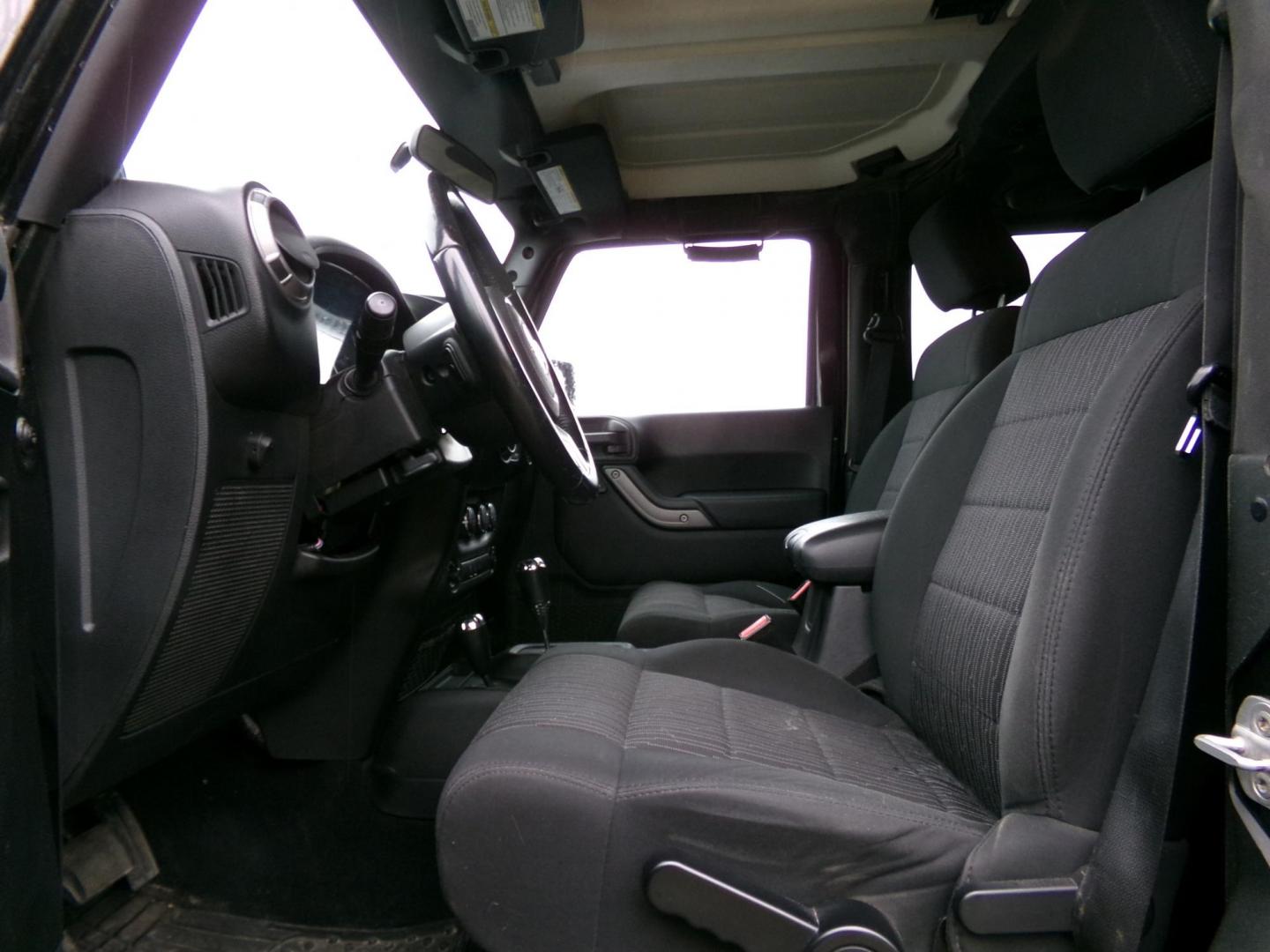 2012 Black Jeep Wrangler Sport 4WD (1C4AJWAG2CL) with an 3.6L V6 DOHC 24V FFV engine, located at 2630 Philips Field Rd., Fairbanks, AK, 99709, (907) 458-0593, 64.848068, -147.780609 - Photo#4