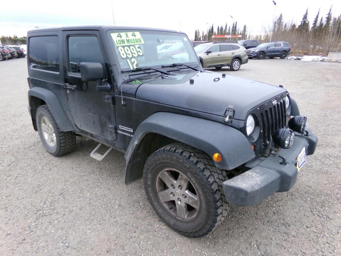 2012 Black Jeep Wrangler Sport 4WD (1C4AJWAG2CL) with an 3.6L V6 DOHC 24V FFV engine, located at 2630 Philips Field Rd., Fairbanks, AK, 99709, (907) 458-0593, 64.848068, -147.780609 - Photo#0