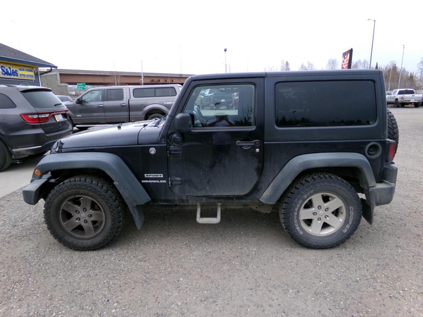 2012 Black Jeep Wrangler Sport 4WD (1C4AJWAG2CL) with an 3.6L V6 DOHC 24V FFV engine, located at 2630 Philips Field Rd., Fairbanks, AK, 99709, (907) 458-0593, 64.848068, -147.780609 - Photo#2