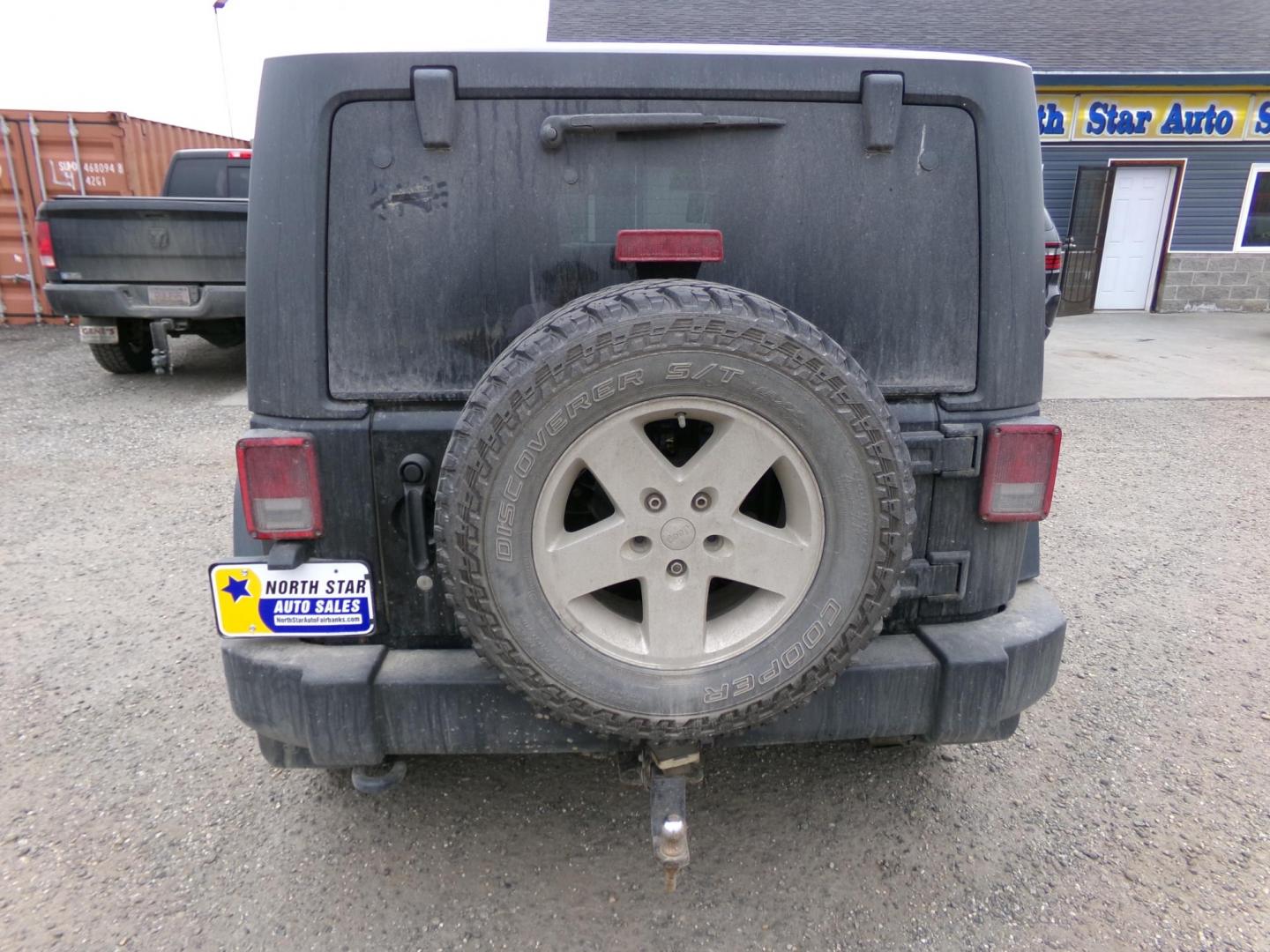 2012 Black Jeep Wrangler Sport 4WD (1C4AJWAG2CL) with an 3.6L V6 DOHC 24V FFV engine, located at 2630 Philips Field Rd., Fairbanks, AK, 99709, (907) 458-0593, 64.848068, -147.780609 - Photo#3