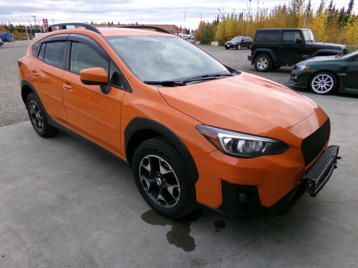 2018 Orange Subaru Crosstrek 2.0i Premium 6M (JF2GTABC2J9) with an 2.0L L4 DOHC 16V engine, Manual transmission, located at 2630 Philips Field Rd., Fairbanks, AK, 99709, (907) 458-0593, 64.848068, -147.780609 - Photo#0