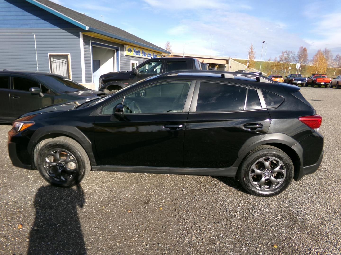 2022 Black Subaru Crosstrek Sport (JF2GTHSC1NH) with an 2.5L H4 SOHC 16V engine, CVT transmission, located at 2630 Philips Field Rd., Fairbanks, AK, 99709, (907) 458-0593, 64.848068, -147.780609 - Photo#2