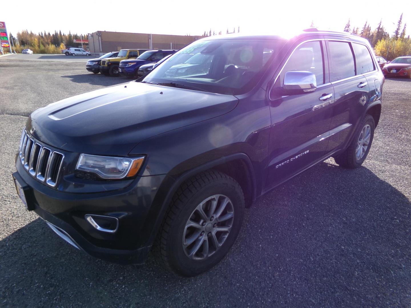 2014 Black Jeep Grand Cherokee Limited 4WD (1C4RJFBG6EC) with an 3.6L V6 DOHC 24V engine, 5-Speed Automatic transmission, located at 2630 Philips Field Rd., Fairbanks, AK, 99709, (907) 458-0593, 64.848068, -147.780609 - Photo#0