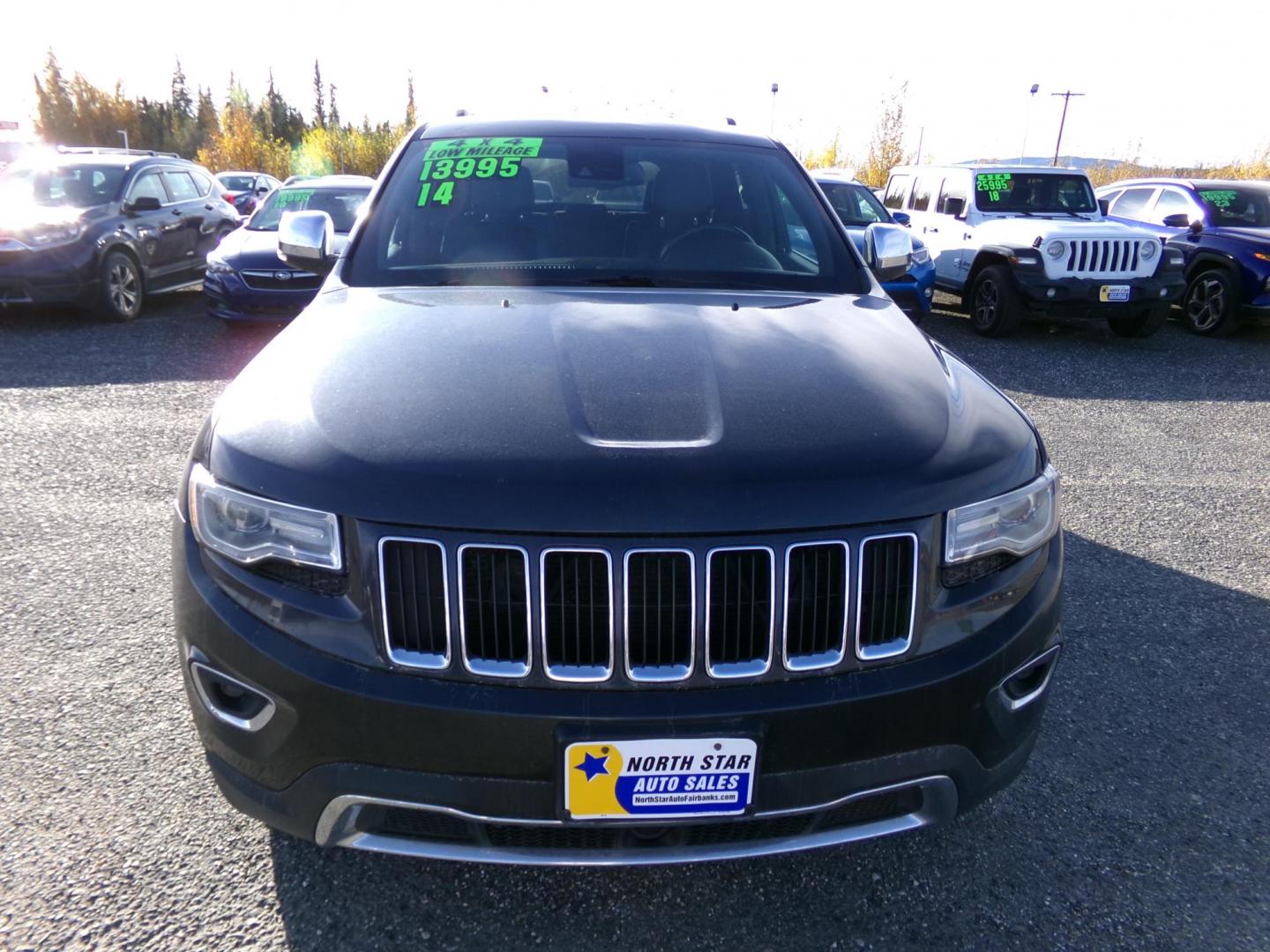 2014 Black Jeep Grand Cherokee Limited 4WD (1C4RJFBG6EC) with an 3.6L V6 DOHC 24V engine, 5-Speed Automatic transmission, located at 2630 Philips Field Rd., Fairbanks, AK, 99709, (907) 458-0593, 64.848068, -147.780609 - Photo#1