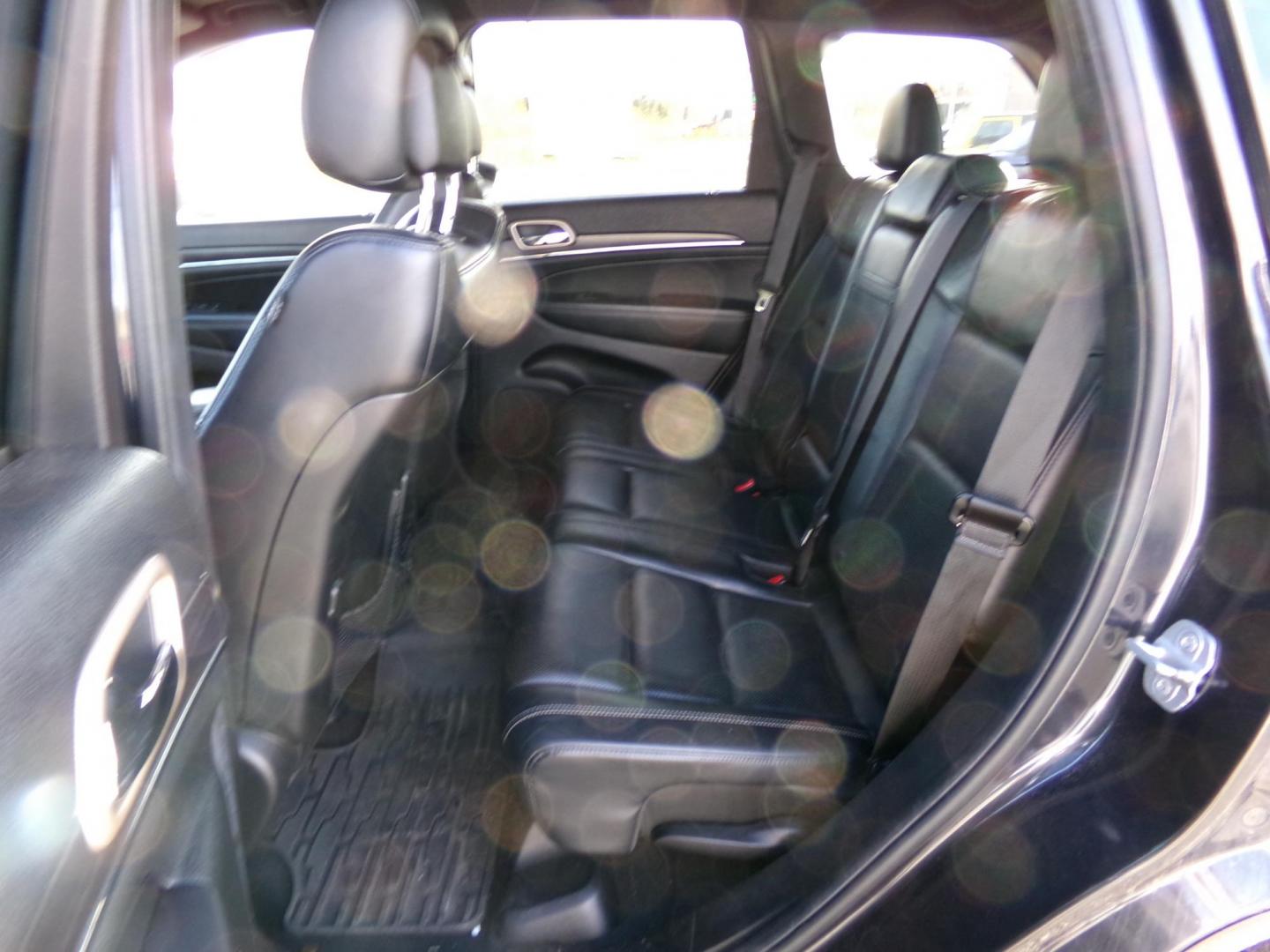 2014 Black Jeep Grand Cherokee Limited 4WD (1C4RJFBG6EC) with an 3.6L V6 DOHC 24V engine, 5-Speed Automatic transmission, located at 2630 Philips Field Rd., Fairbanks, AK, 99709, (907) 458-0593, 64.848068, -147.780609 - Photo#5