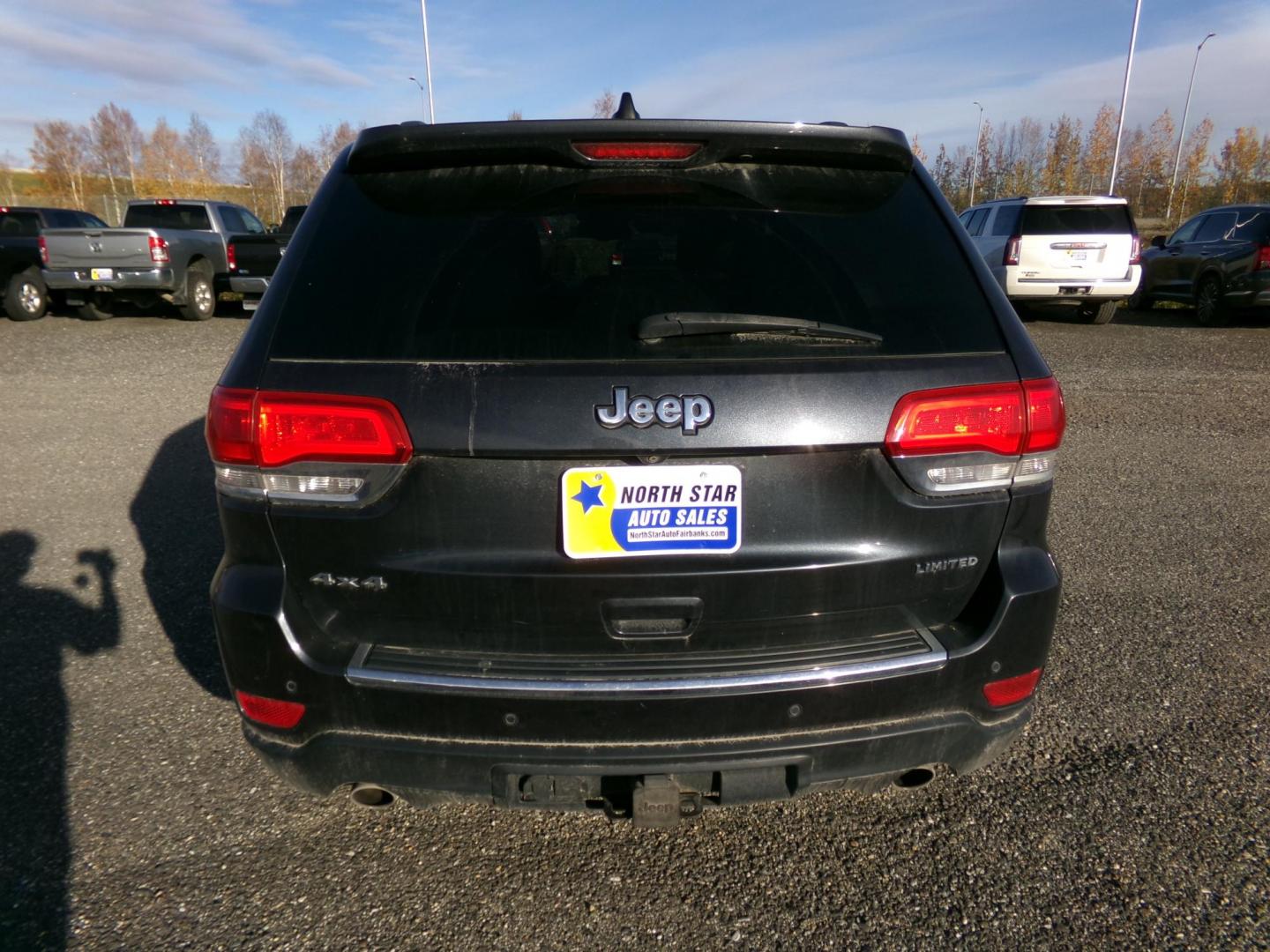 2014 Black Jeep Grand Cherokee Limited 4WD (1C4RJFBG6EC) with an 3.6L V6 DOHC 24V engine, 5-Speed Automatic transmission, located at 2630 Philips Field Rd., Fairbanks, AK, 99709, (907) 458-0593, 64.848068, -147.780609 - Photo#3