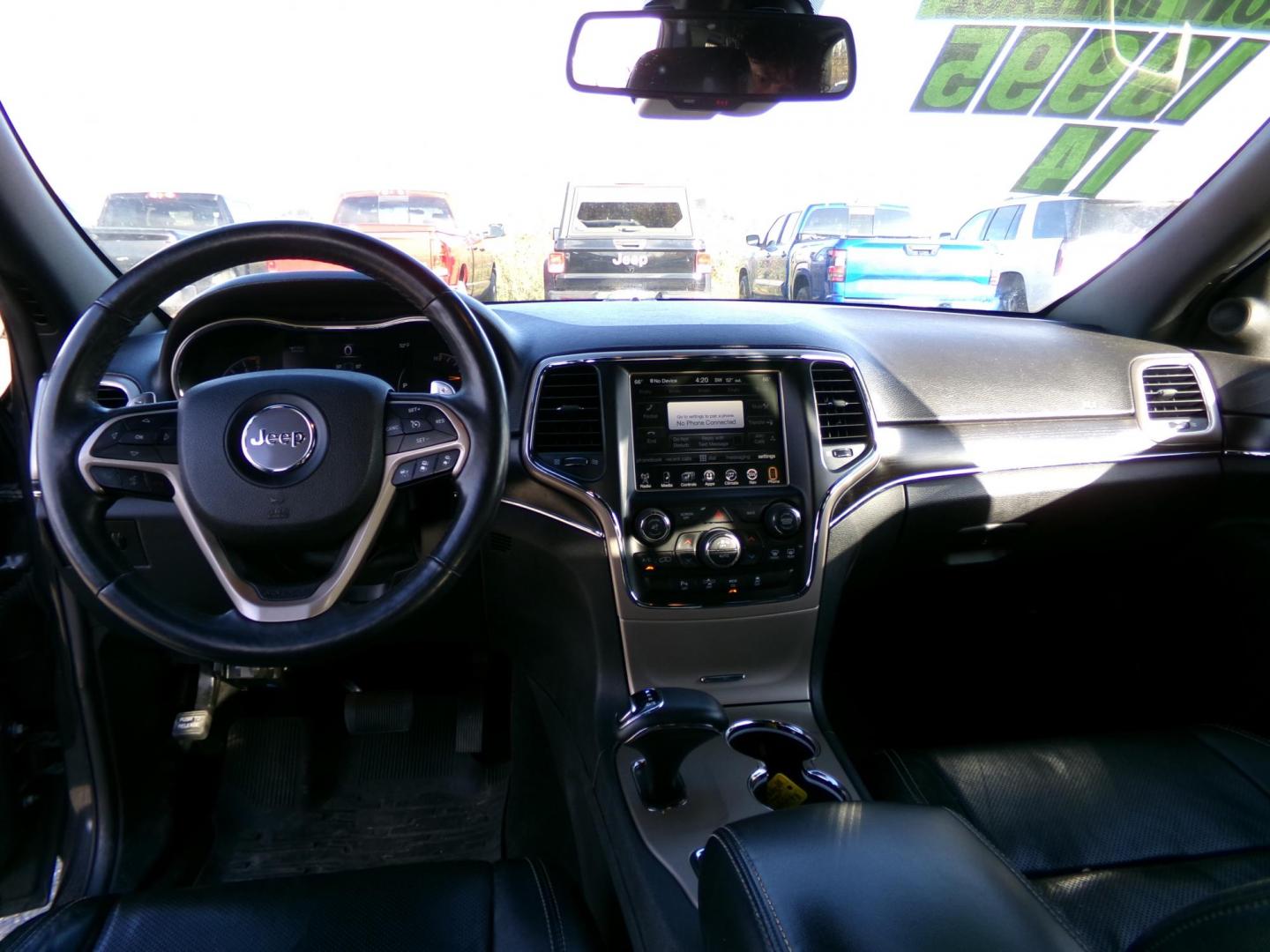 2014 Black Jeep Grand Cherokee Limited 4WD (1C4RJFBG6EC) with an 3.6L V6 DOHC 24V engine, 5-Speed Automatic transmission, located at 2630 Philips Field Rd., Fairbanks, AK, 99709, (907) 458-0593, 64.848068, -147.780609 - Photo#6