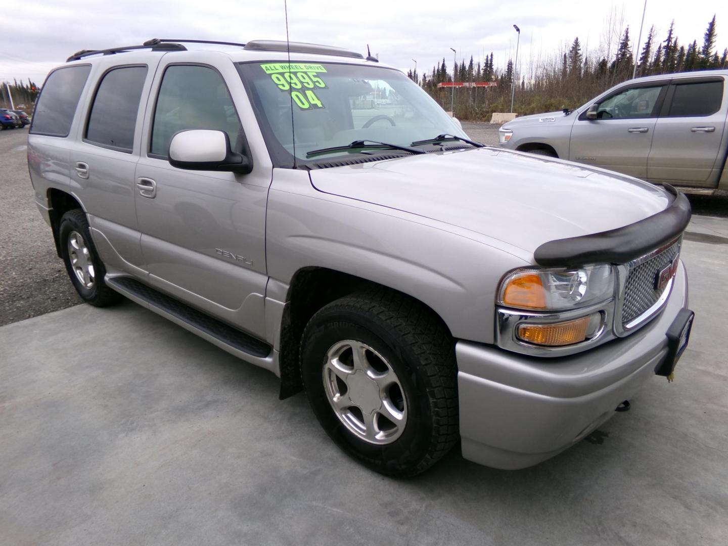 2004 Gold GMC Yukon Denali Base (1GKEK63UX4J) with an 6.0L V8 OHV 16V engine, 4-Speed Automatic Overdrive transmission, located at 2630 Philips Field Rd., Fairbanks, AK, 99709, (907) 458-0593, 64.848068, -147.780609 - Photo#0
