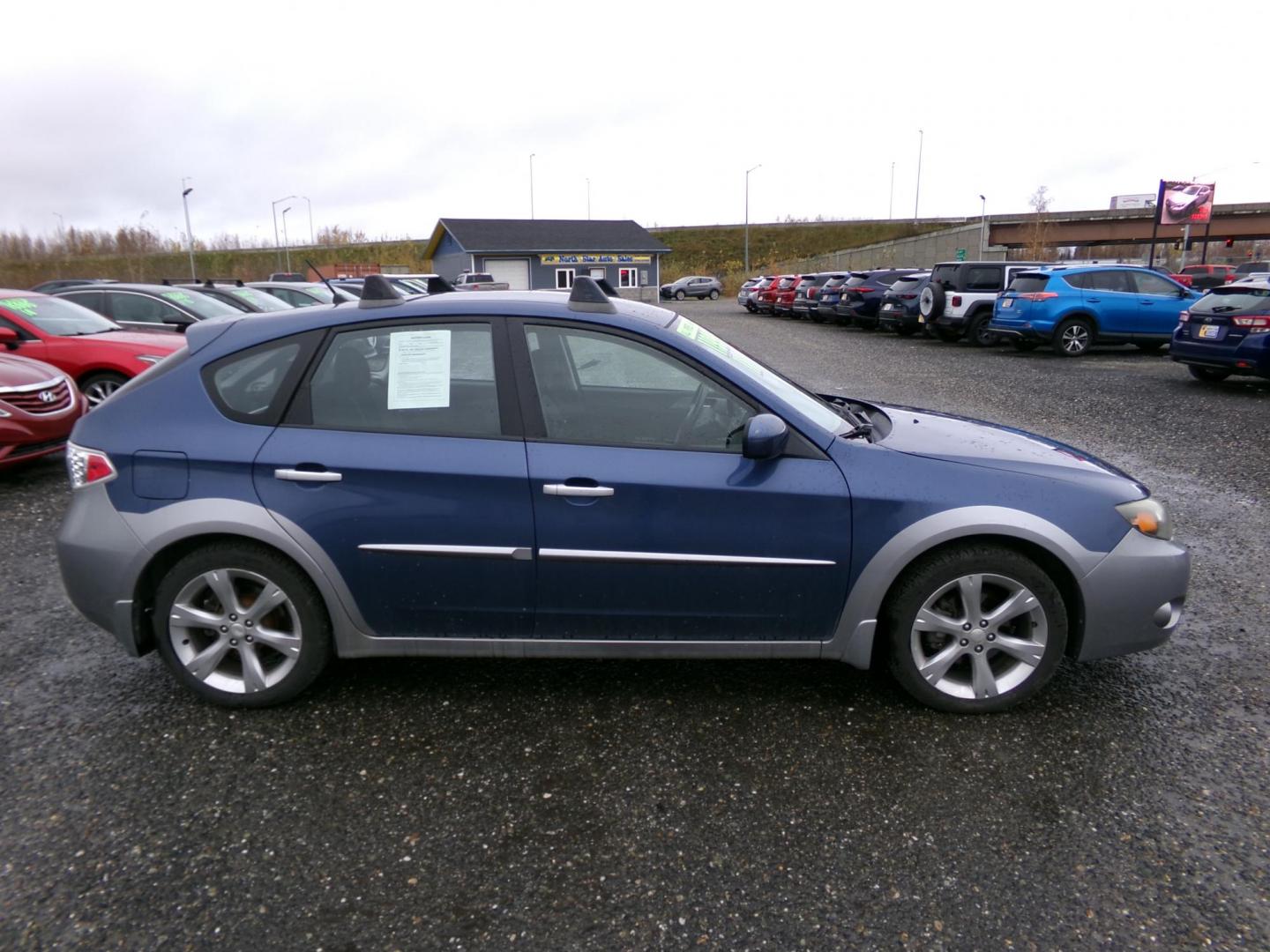 2011 Blue Subaru Impreza Outback Sport (JF1GH6D61BG) with an 2.5L H4 SOHC 16V engine, 5-Speed Manual transmission, located at 2630 Philips Field Rd., Fairbanks, AK, 99709, (907) 458-0593, 64.848068, -147.780609 - Photo#2