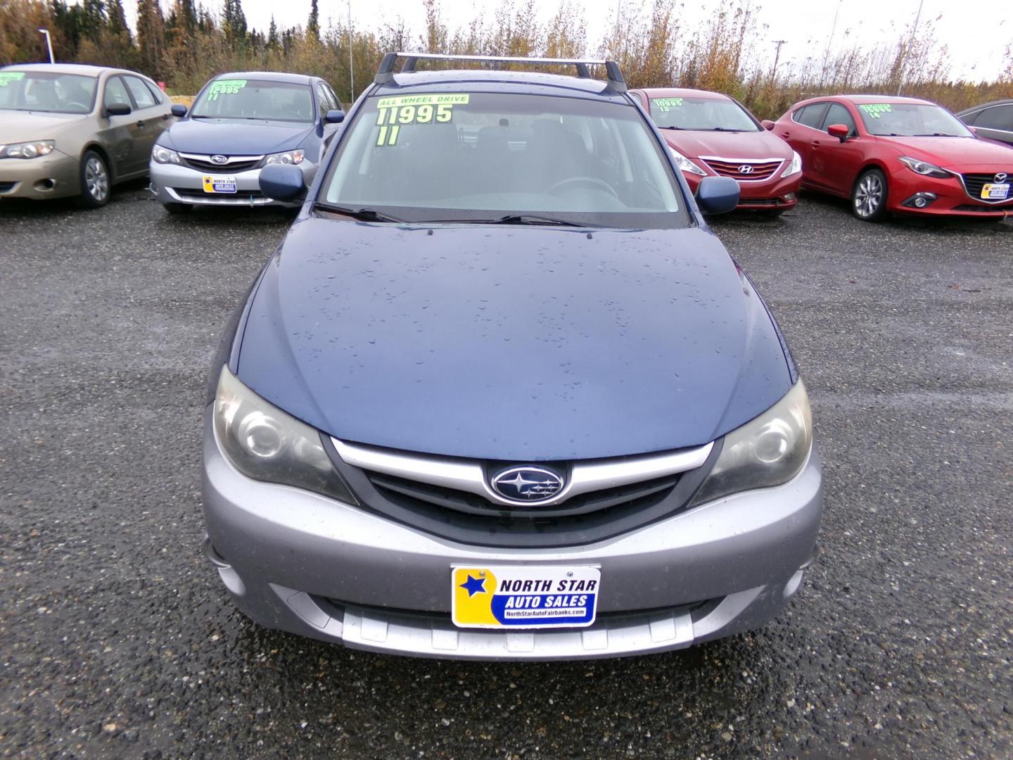2011 Blue Subaru Impreza Outback Sport (JF1GH6D61BG) with an 2.5L H4 SOHC 16V engine, 5-Speed Manual transmission, located at 2630 Philips Field Rd., Fairbanks, AK, 99709, (907) 458-0593, 64.848068, -147.780609 - Photo#1