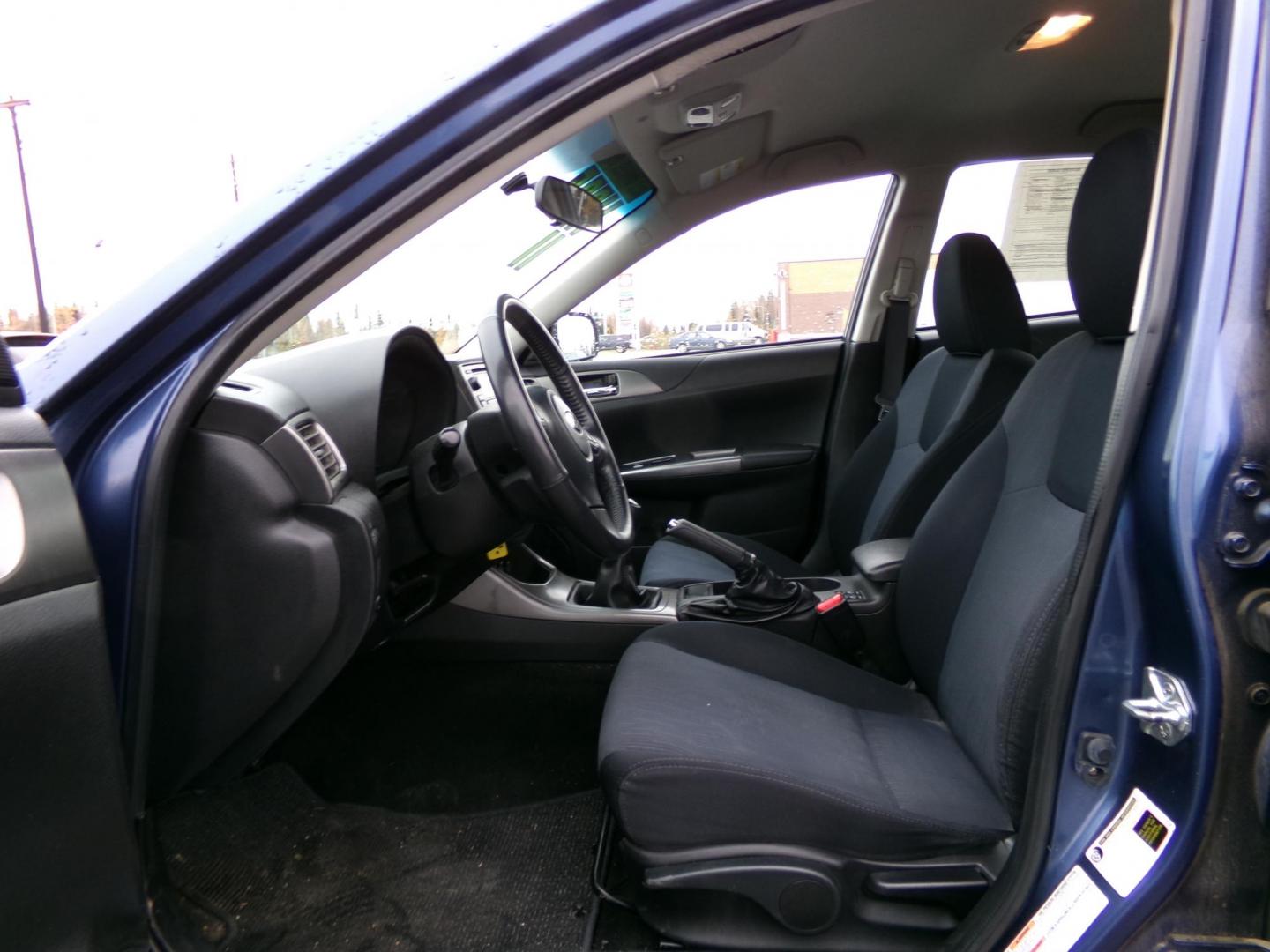 2011 Blue Subaru Impreza Outback Sport (JF1GH6D61BG) with an 2.5L H4 SOHC 16V engine, 5-Speed Manual transmission, located at 2630 Philips Field Rd., Fairbanks, AK, 99709, (907) 458-0593, 64.848068, -147.780609 - Photo#4