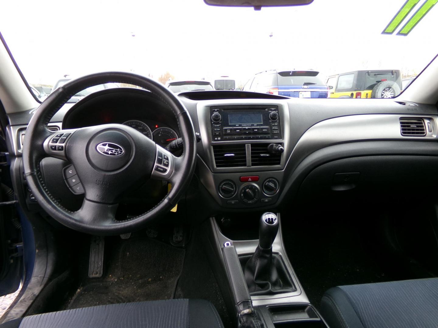 2011 Blue Subaru Impreza Outback Sport (JF1GH6D61BG) with an 2.5L H4 SOHC 16V engine, 5-Speed Manual transmission, located at 2630 Philips Field Rd., Fairbanks, AK, 99709, (907) 458-0593, 64.848068, -147.780609 - Photo#6