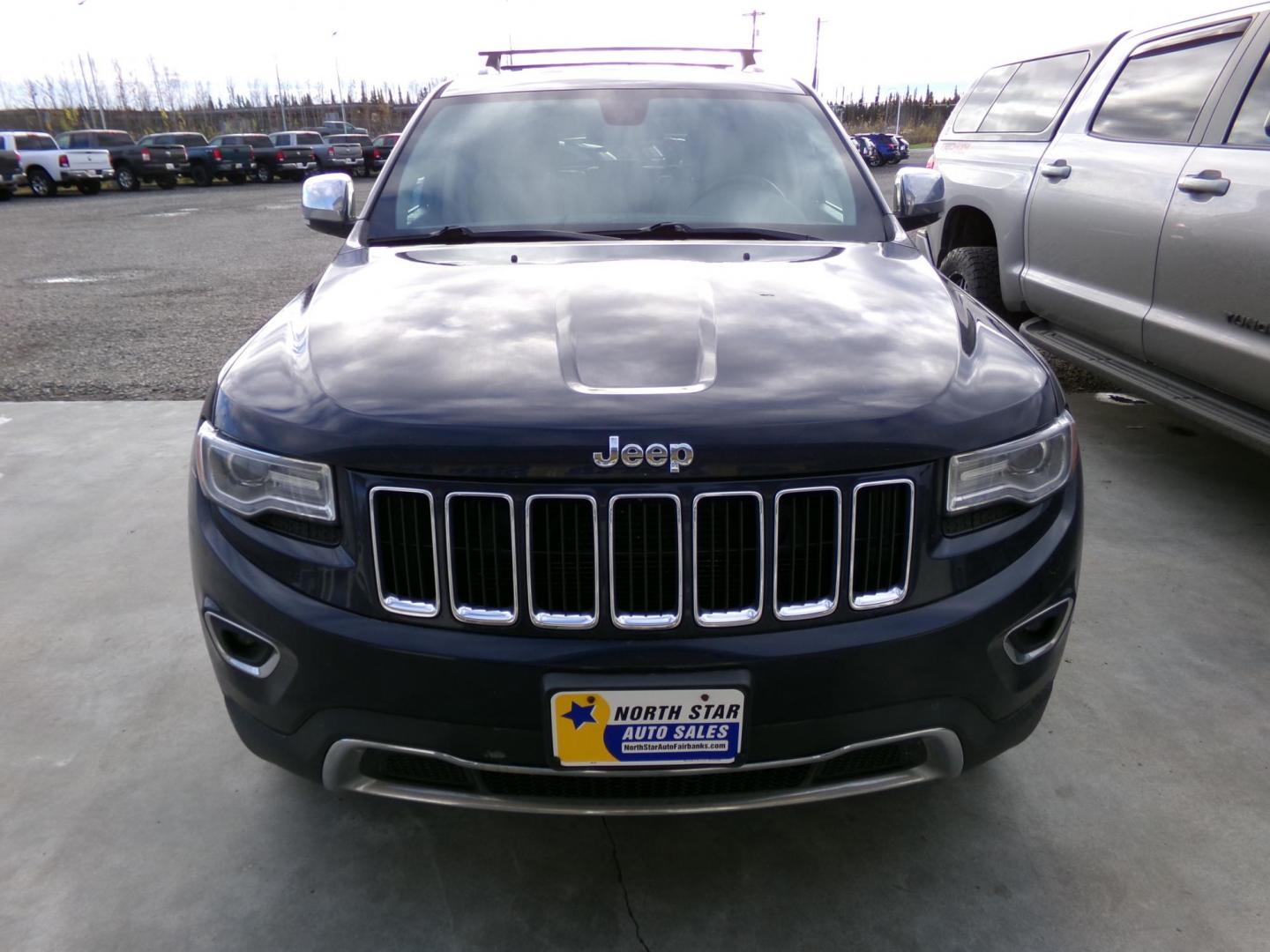 2015 Blue Jeep Grand Cherokee Limited 4WD (1C4RJFBG8FC) with an 3.6L V6 DOHC 24V engine, 8-Speed Automatic transmission, located at 2630 Philips Field Rd., Fairbanks, AK, 99709, (907) 458-0593, 64.848068, -147.780609 - Photo#1
