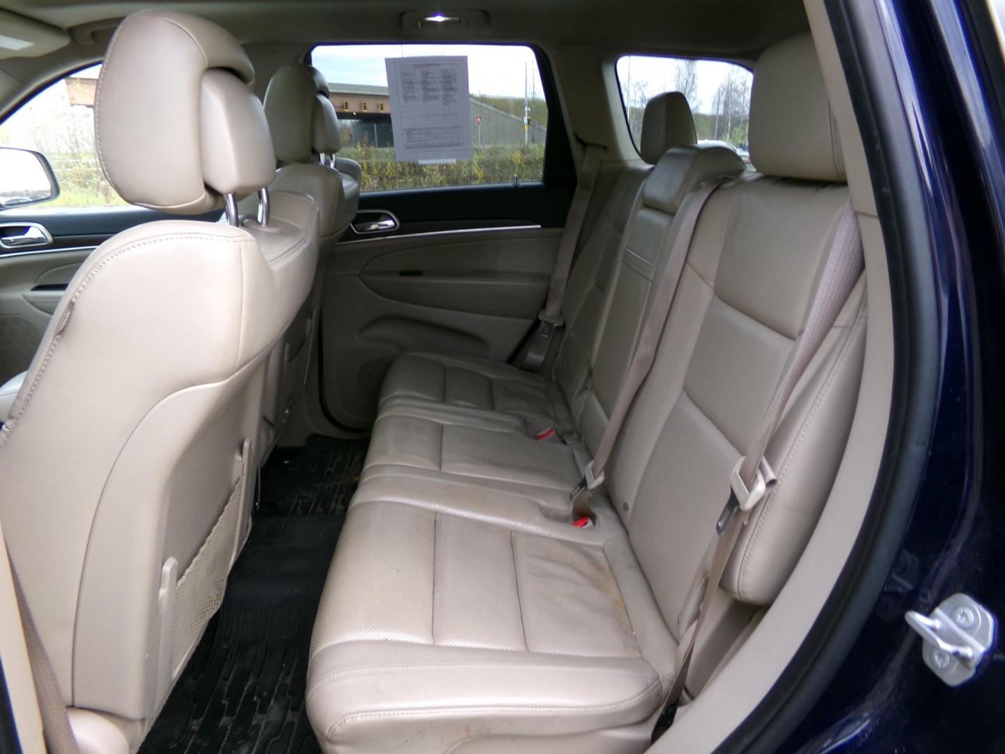 2015 Blue Jeep Grand Cherokee Limited 4WD (1C4RJFBG8FC) with an 3.6L V6 DOHC 24V engine, 8-Speed Automatic transmission, located at 2630 Philips Field Rd., Fairbanks, AK, 99709, (907) 458-0593, 64.848068, -147.780609 - Photo#5