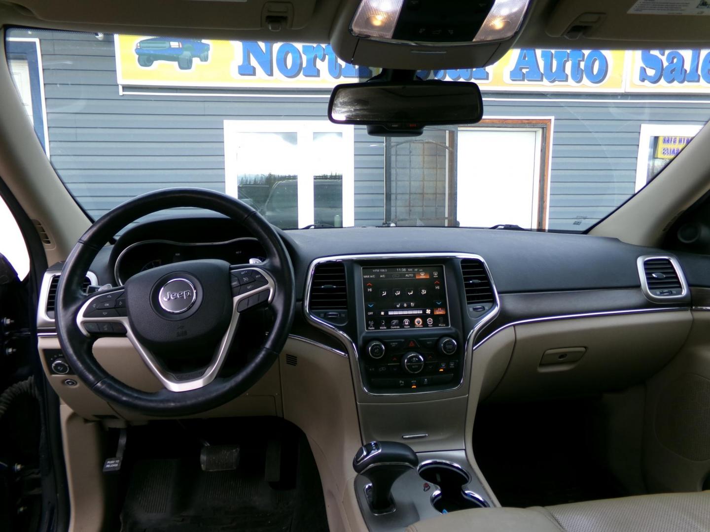 2015 Blue Jeep Grand Cherokee Limited 4WD (1C4RJFBG8FC) with an 3.6L V6 DOHC 24V engine, 8-Speed Automatic transmission, located at 2630 Philips Field Rd., Fairbanks, AK, 99709, (907) 458-0593, 64.848068, -147.780609 - Photo#6