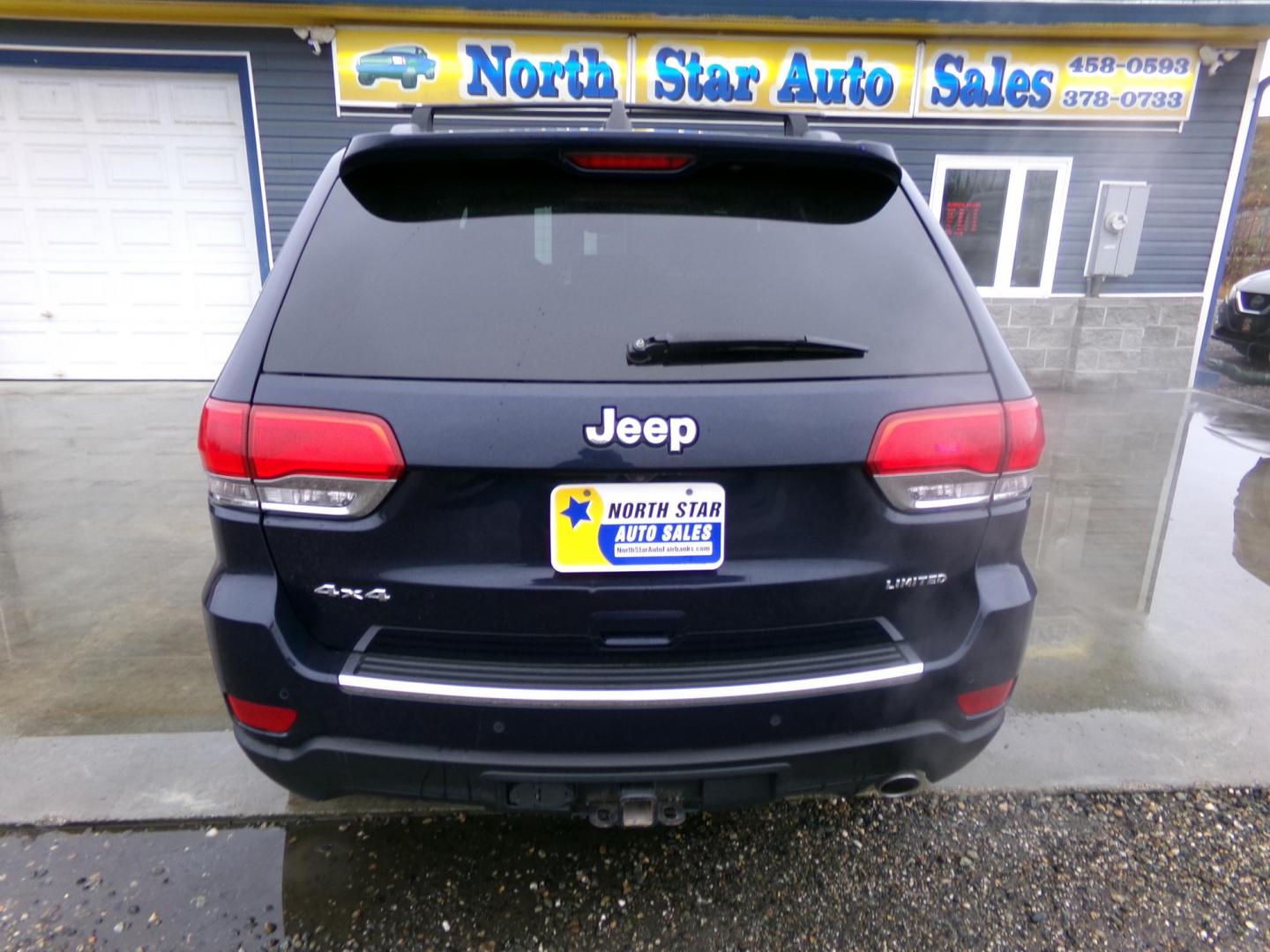 2015 Blue Jeep Grand Cherokee Limited 4WD (1C4RJFBG8FC) with an 3.6L V6 DOHC 24V engine, 8-Speed Automatic transmission, located at 2630 Philips Field Rd., Fairbanks, AK, 99709, (907) 458-0593, 64.848068, -147.780609 - Photo#3