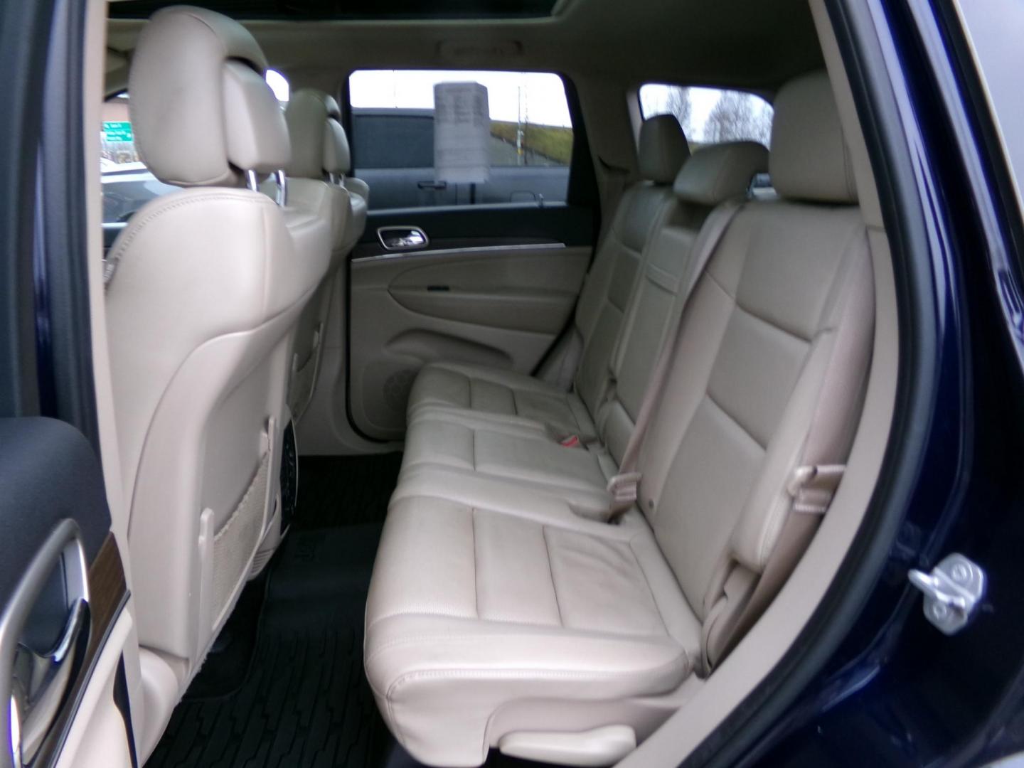 2015 Blue Jeep Grand Cherokee Limited 4WD (1C4RJFBG8FC) with an 3.6L V6 DOHC 24V engine, 8-Speed Automatic transmission, located at 2630 Philips Field Rd., Fairbanks, AK, 99709, (907) 458-0593, 64.848068, -147.780609 - Photo#5