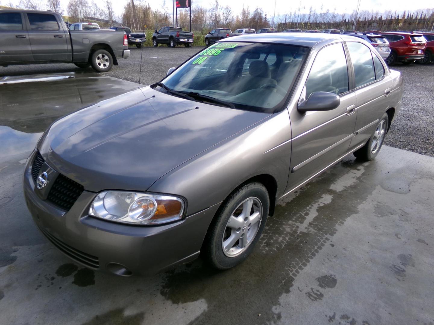 2004 Gold Nissan Sentra 2.5 S (3N1AB51A44L) with an 2.5L L4 DOHC 16V engine, 4-Speed Automatic Overdrive transmission, located at 2630 Philips Field Rd., Fairbanks, AK, 99709, (907) 458-0593, 64.848068, -147.780609 - Photo#0