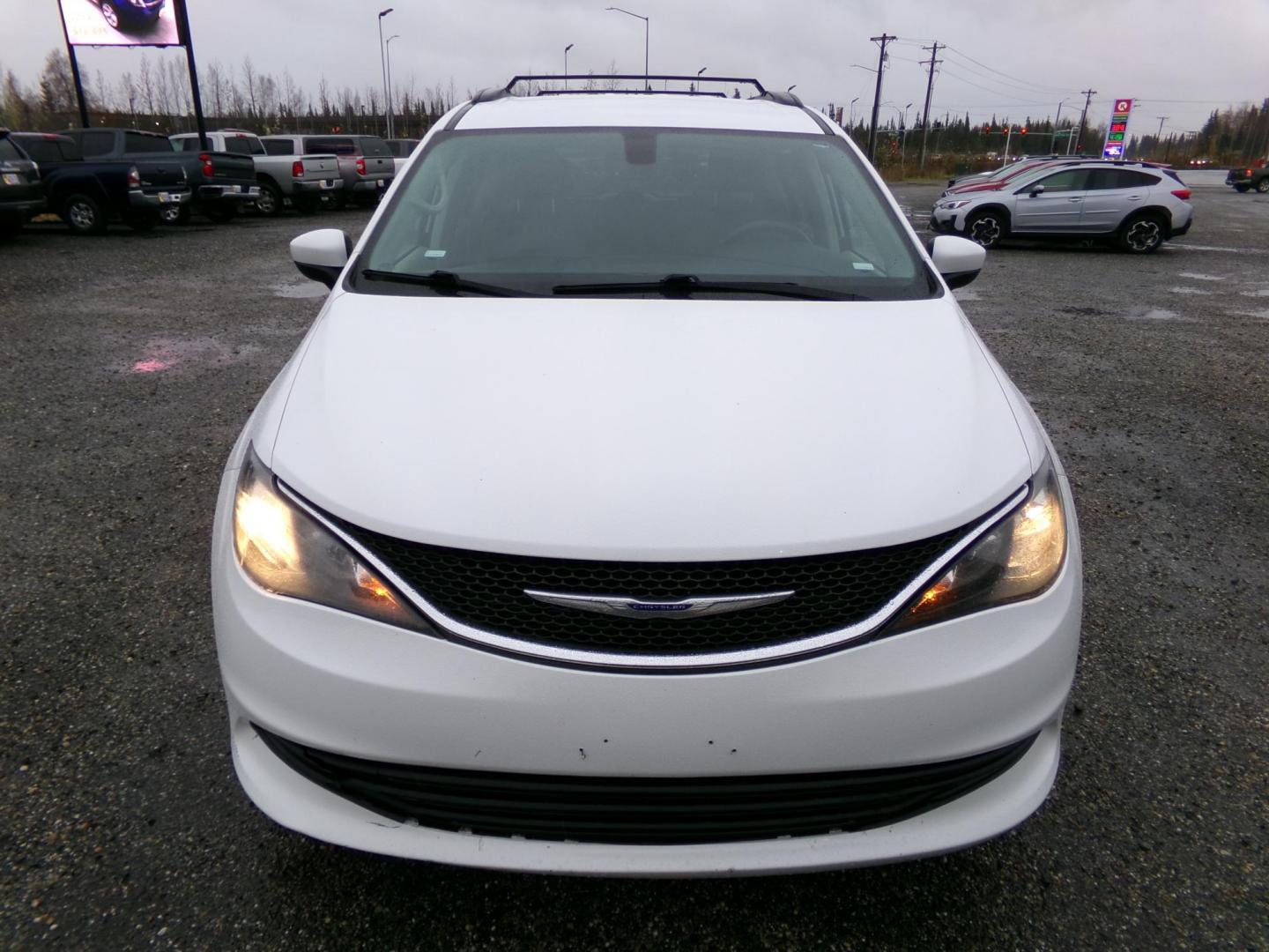 2020 White Chrysler Voyager LXI (2C4RC1DG7LR) with an 3.6L V6 DOHC 24V engine, 9A transmission, located at 2630 Philips Field Rd., Fairbanks, AK, 99709, (907) 458-0593, 64.848068, -147.780609 - Photo#1