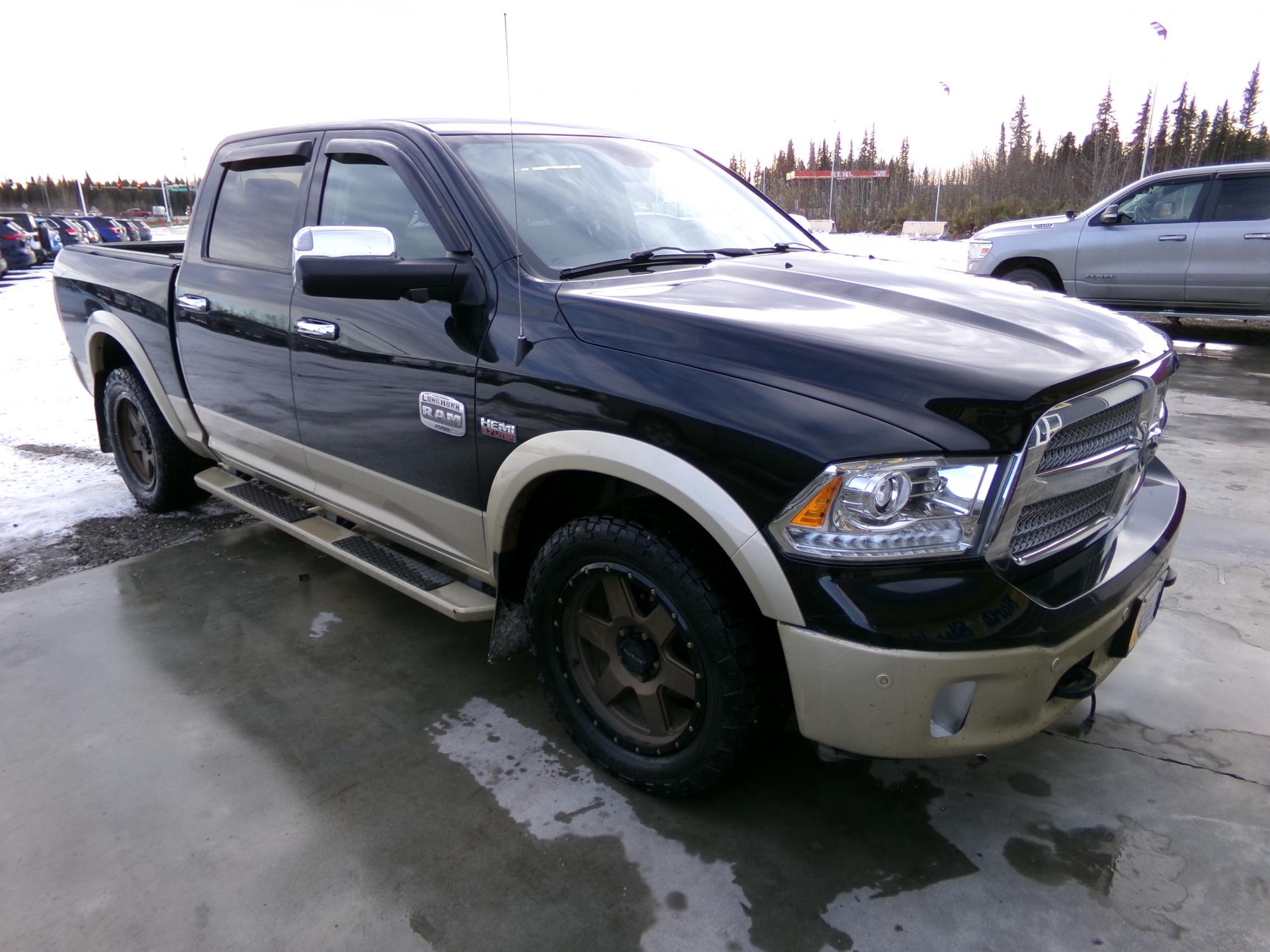 photo of 2015 RAM 1500 Laramie Longhorn Crew Cab SWB 4WD