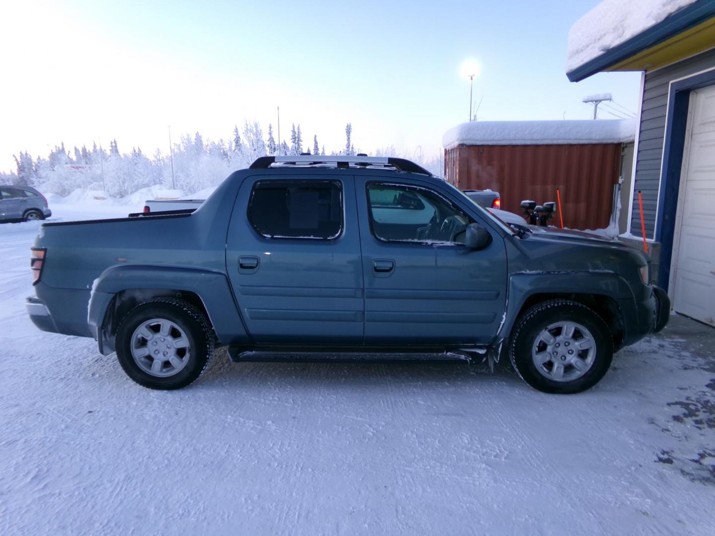 2006 Blue Honda Ridgeline RTL (2HJYK16576H) with an 3.5L V6 SOHC 24V engine, 5-Speed Automatic Overdrive transmission, located at 2630 Philips Field Rd., Fairbanks, AK, 99709, (907) 458-0593, 64.848068, -147.780609 - Photo#2